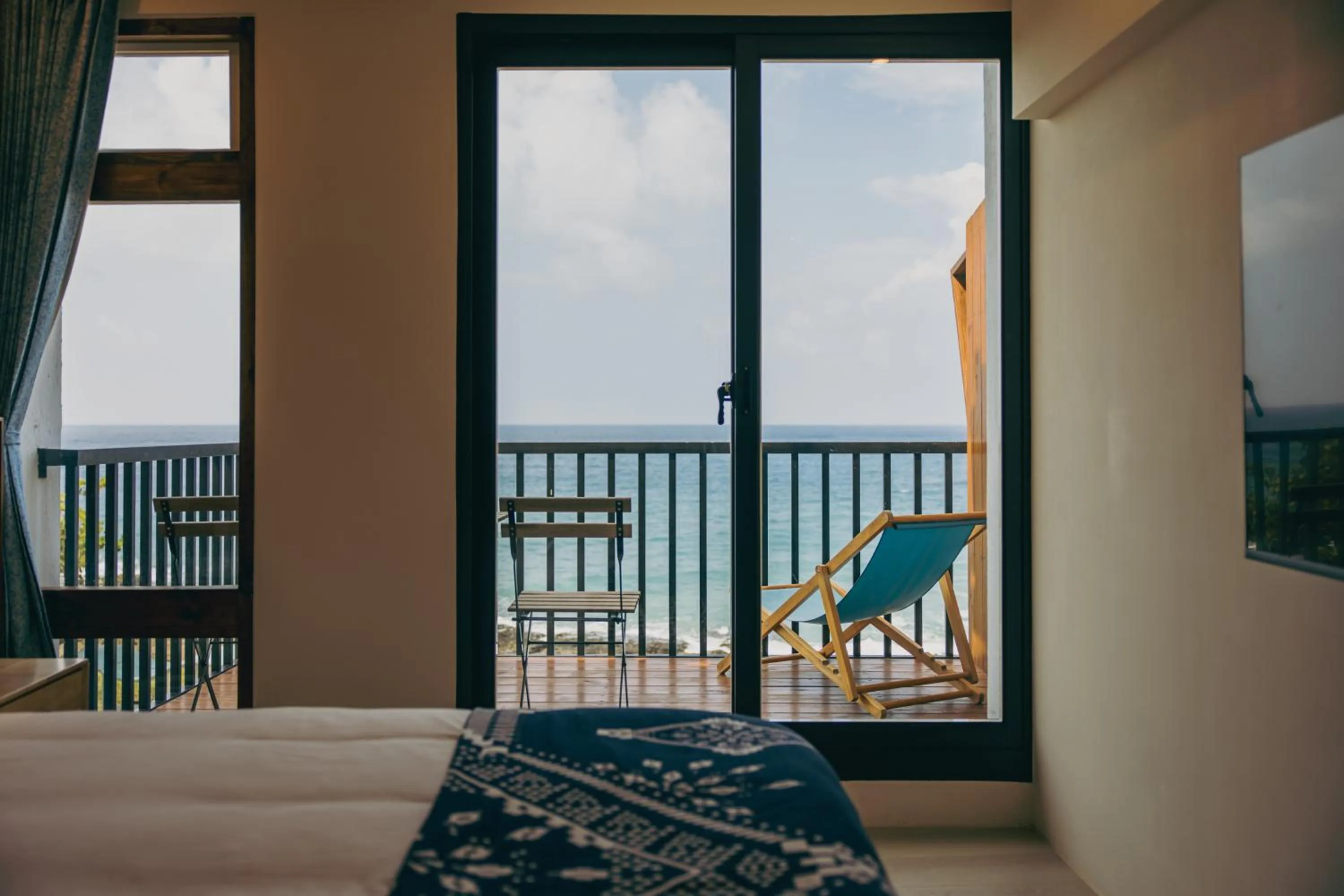 Bed in Chuanfanrock Haku Beach Days Inn