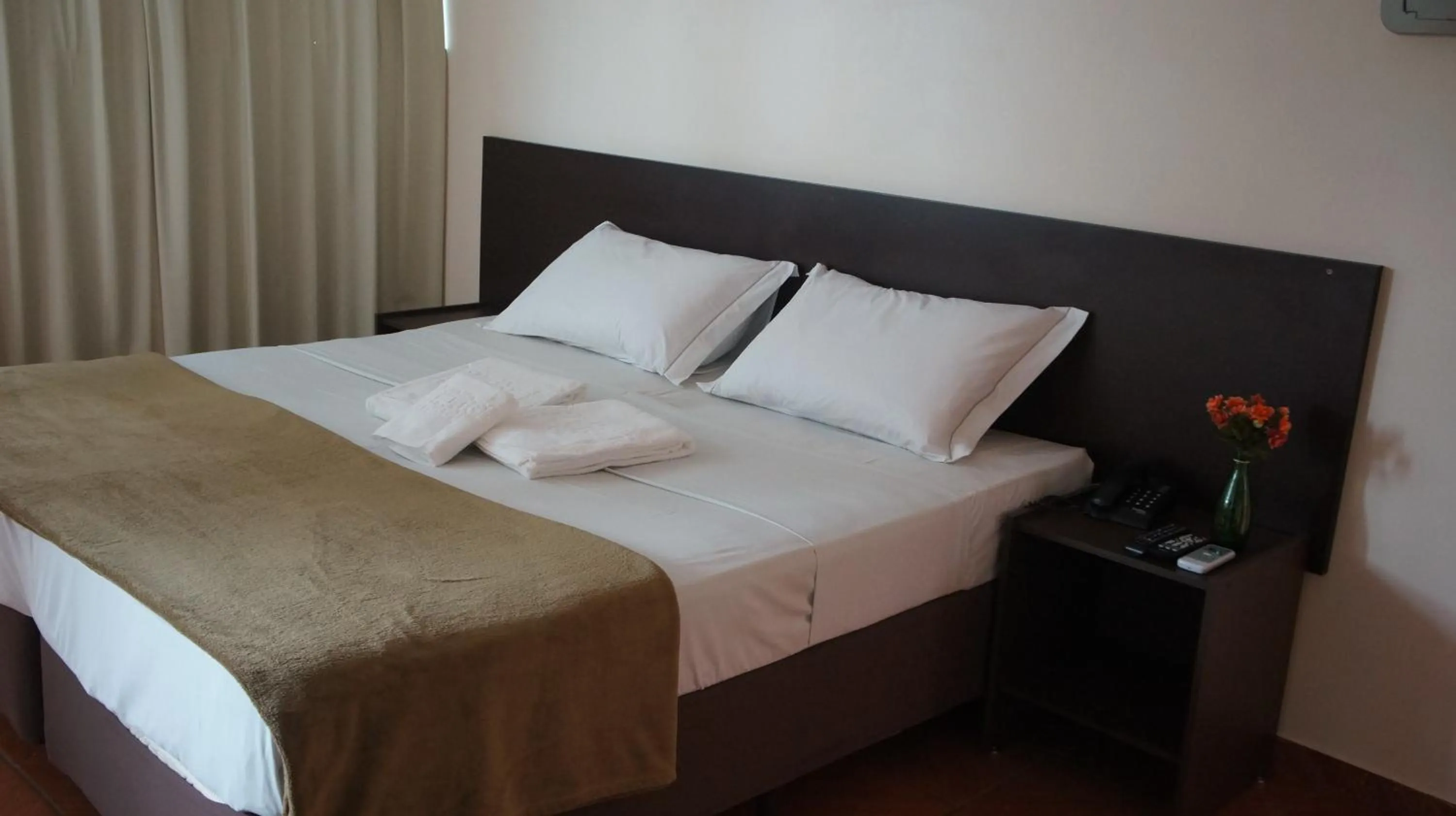 Bed in Pinheiros Hotel
