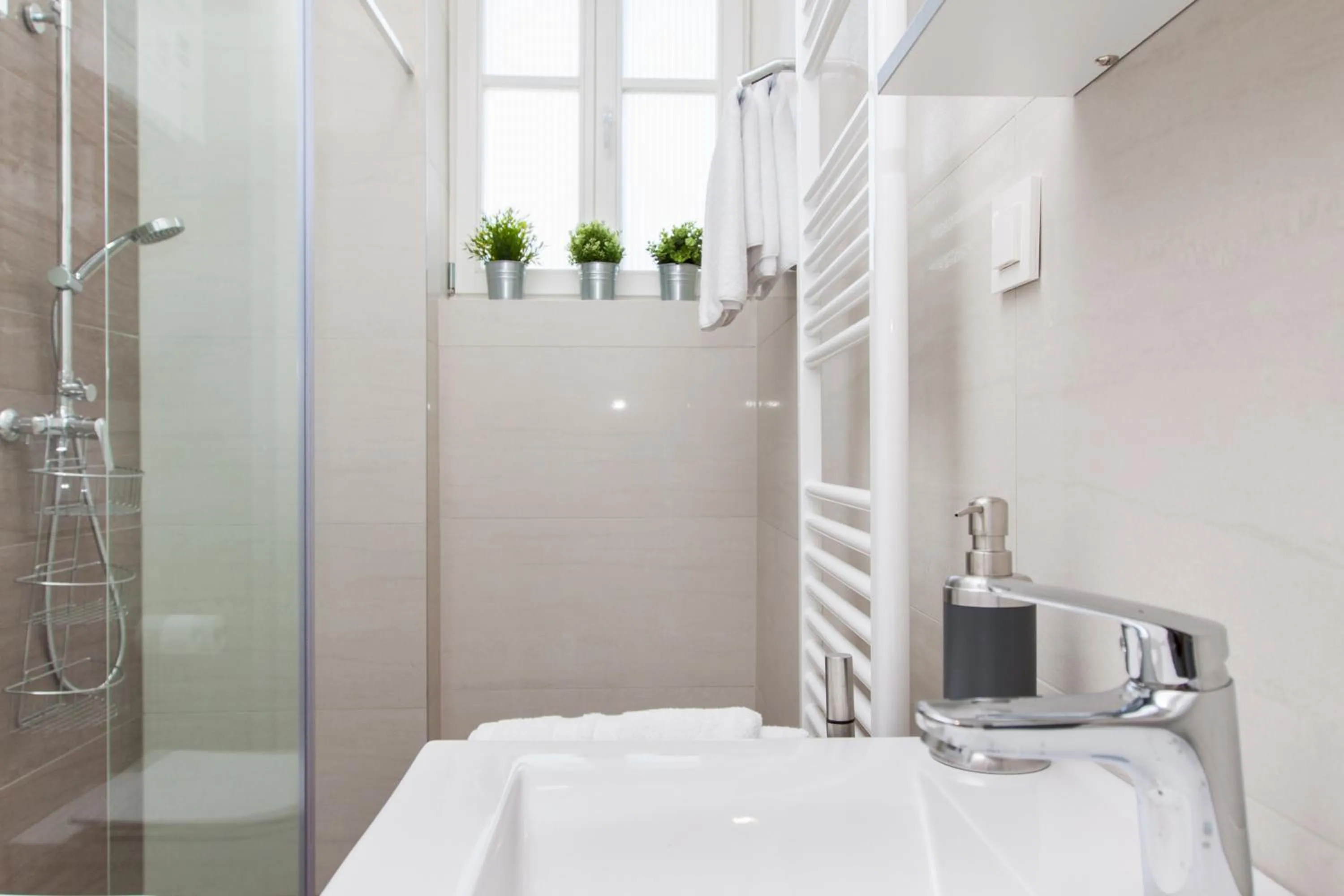 Bathroom in Luxury Main Square Apartments