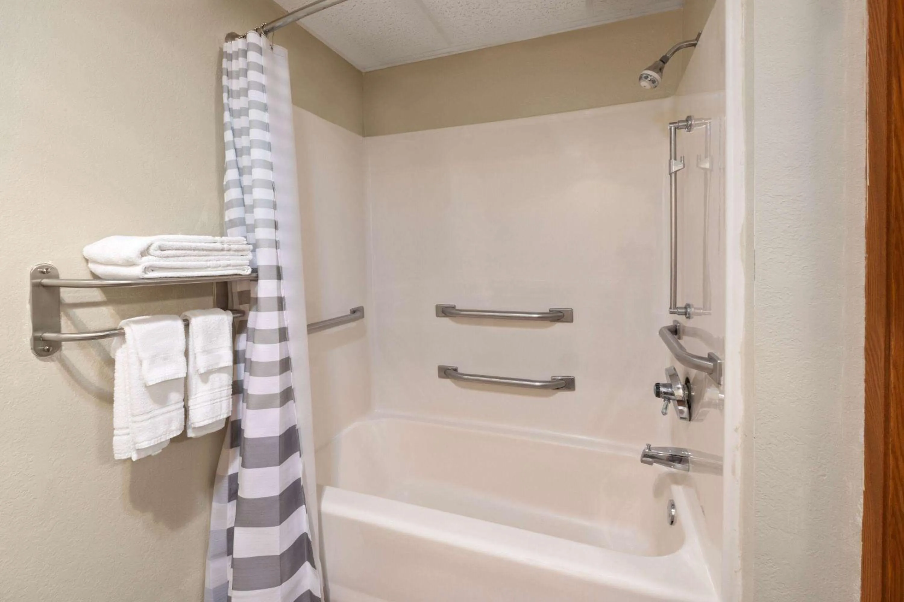 Shower in Travelodge by Wyndham Redwood Falls
