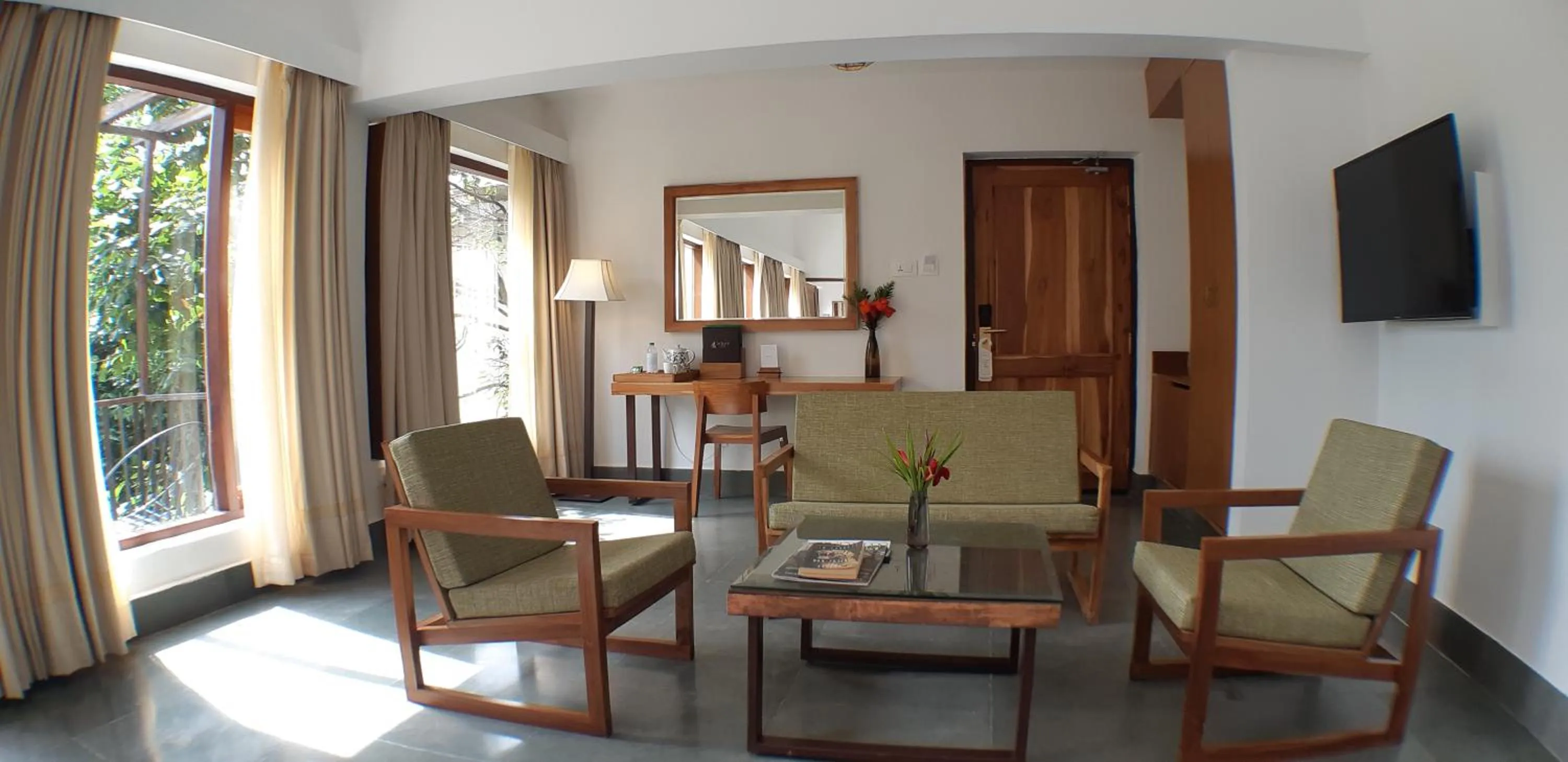 Communal lounge/ TV room in Saraca Resort & Spa Corbett