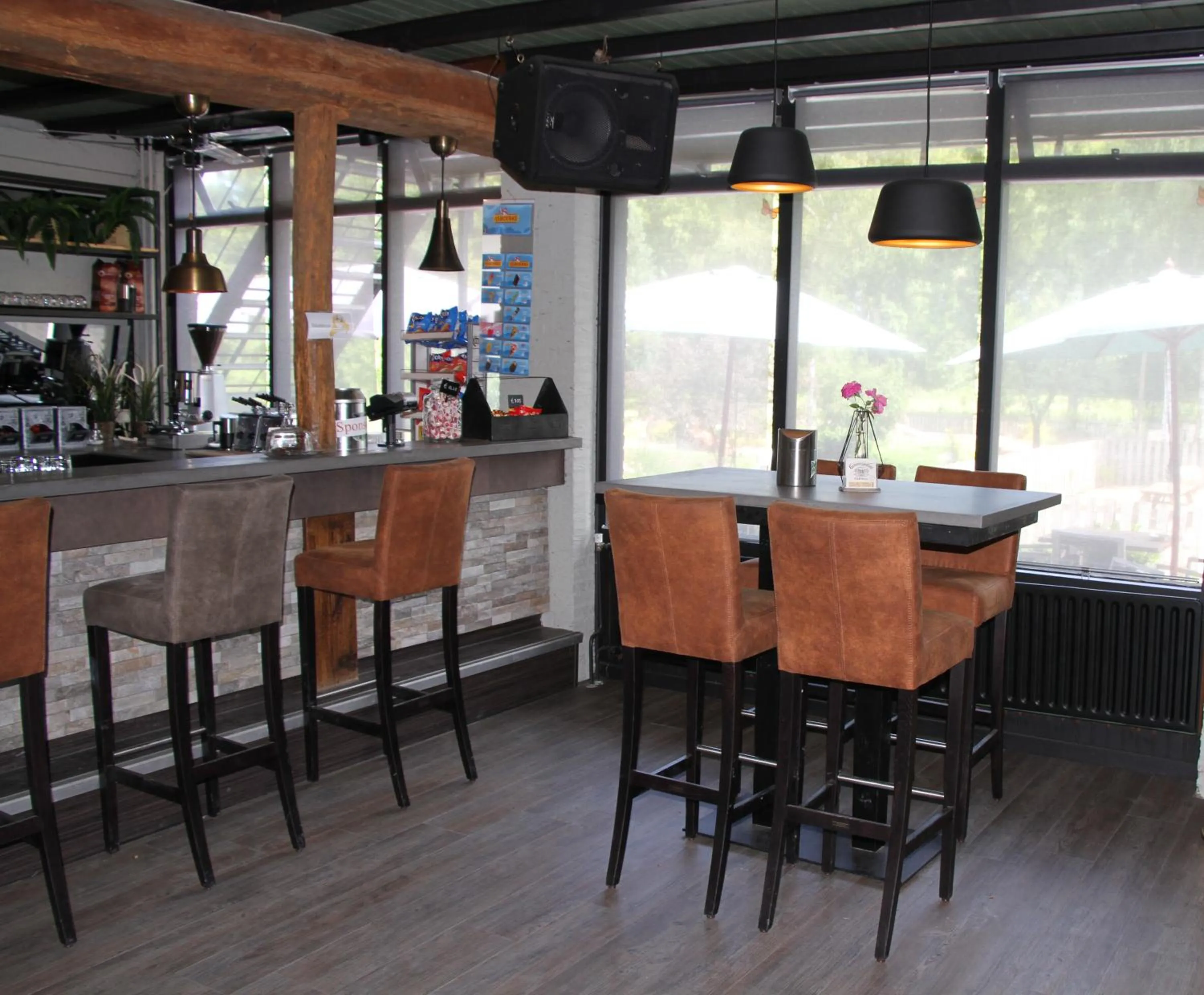 Lounge or bar in B&B de Rekkendonken