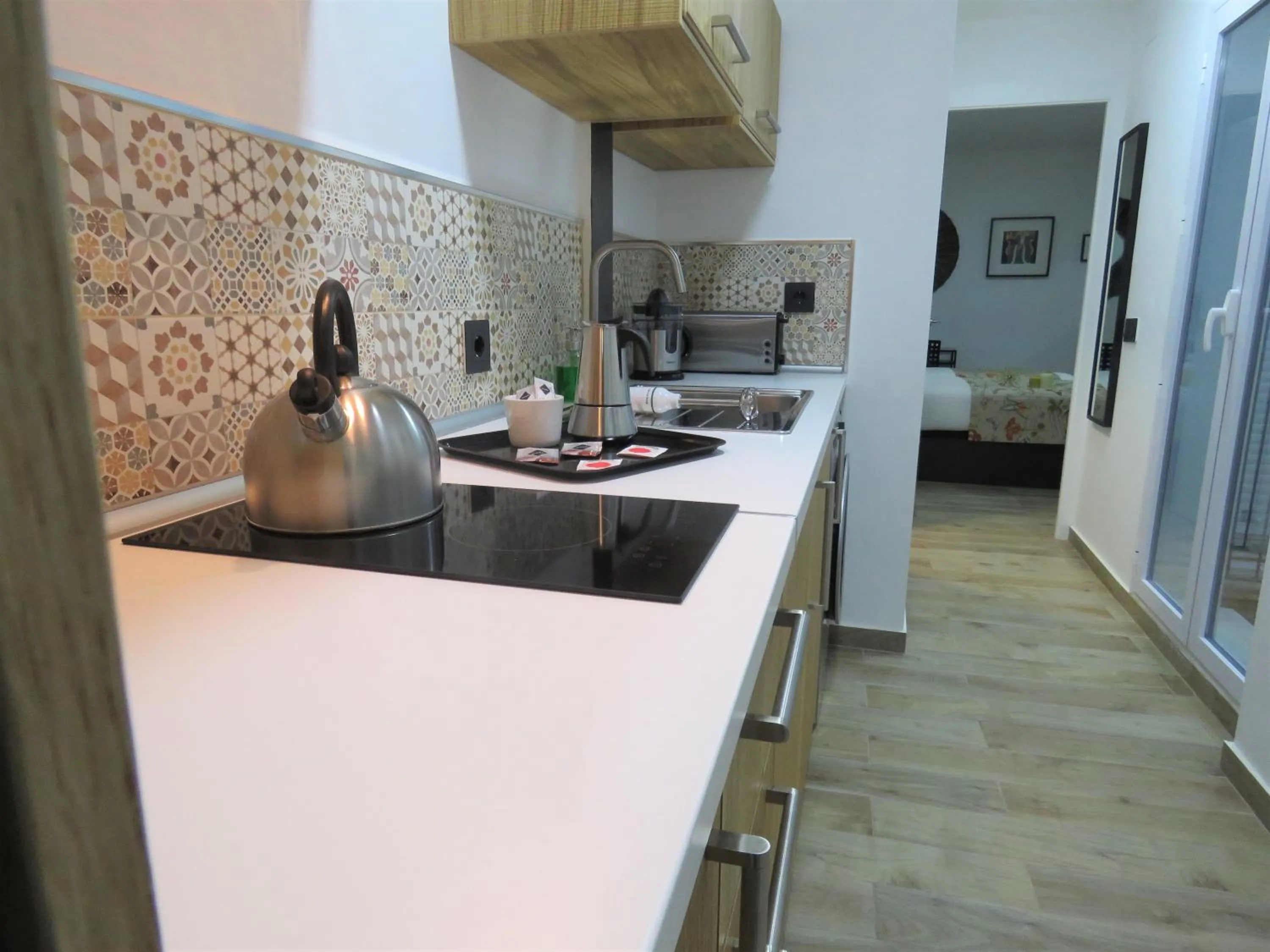 Kitchen or kitchenette in Living Sevilla Apartments Hércules
