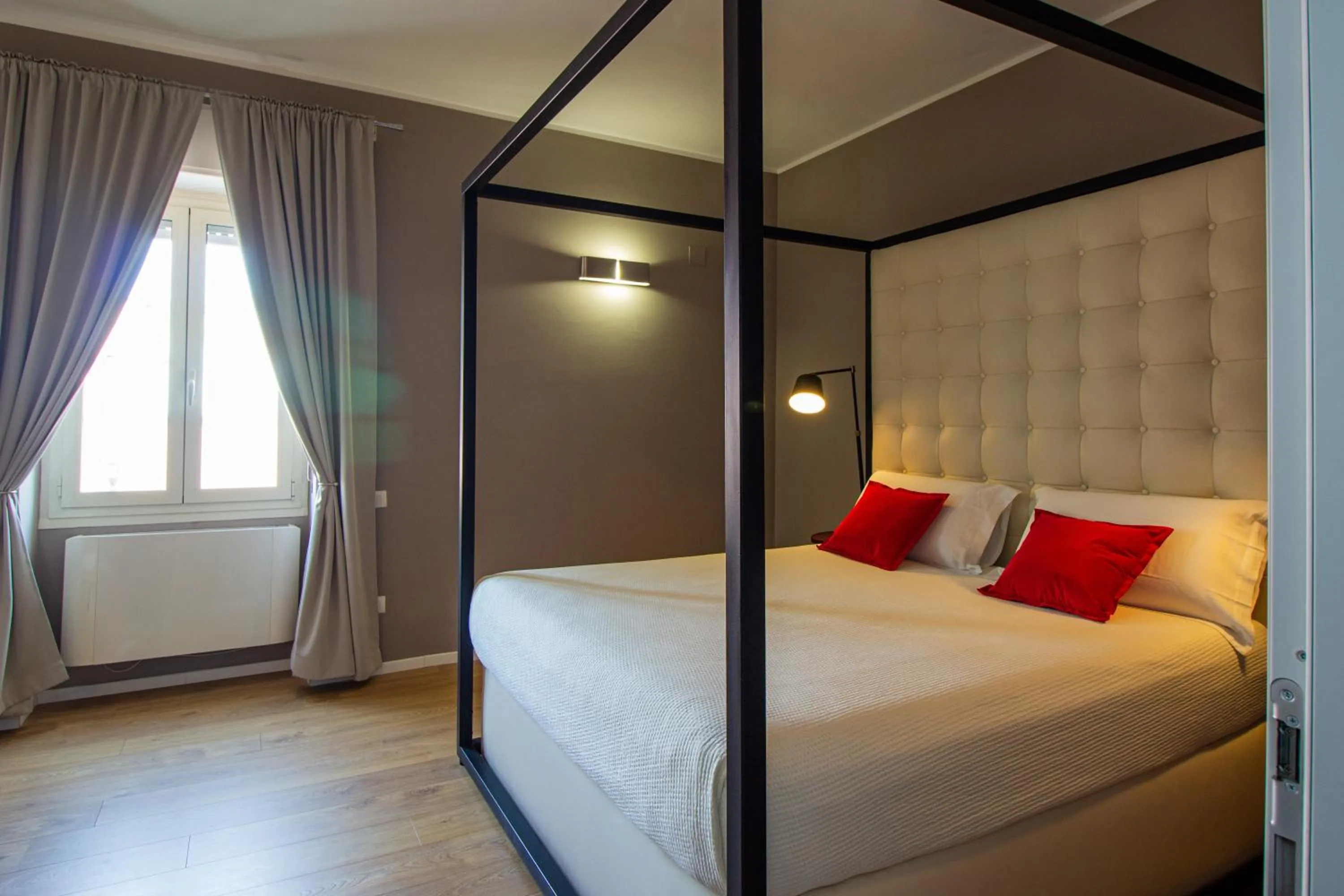 Bed in Album Boutique Rooms