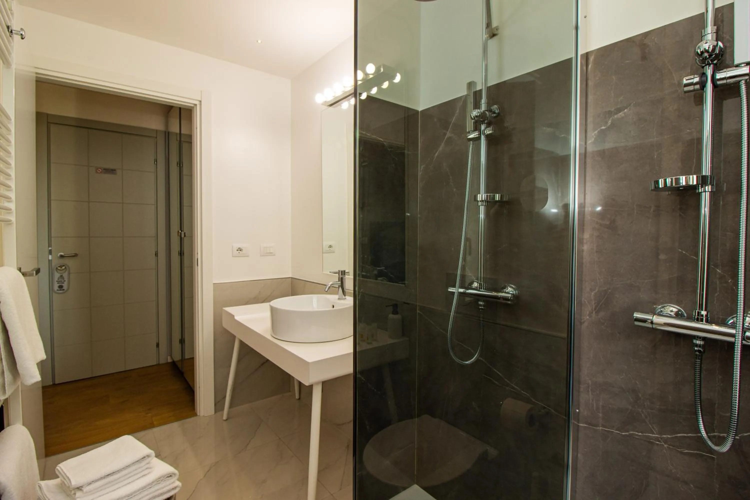 Shower in Album Boutique Rooms