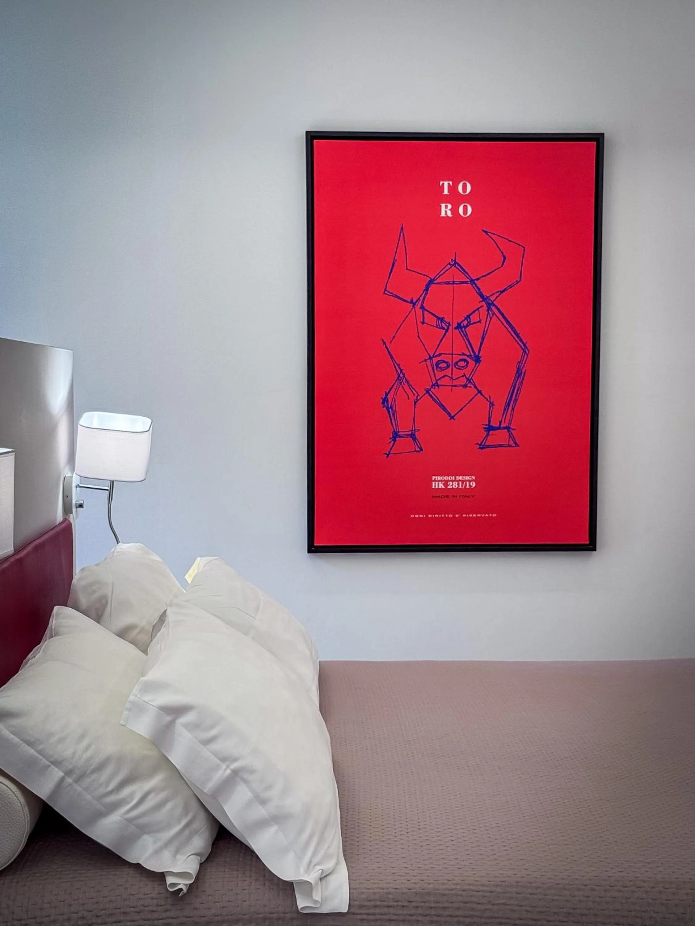 Bed in Album Boutique Rooms