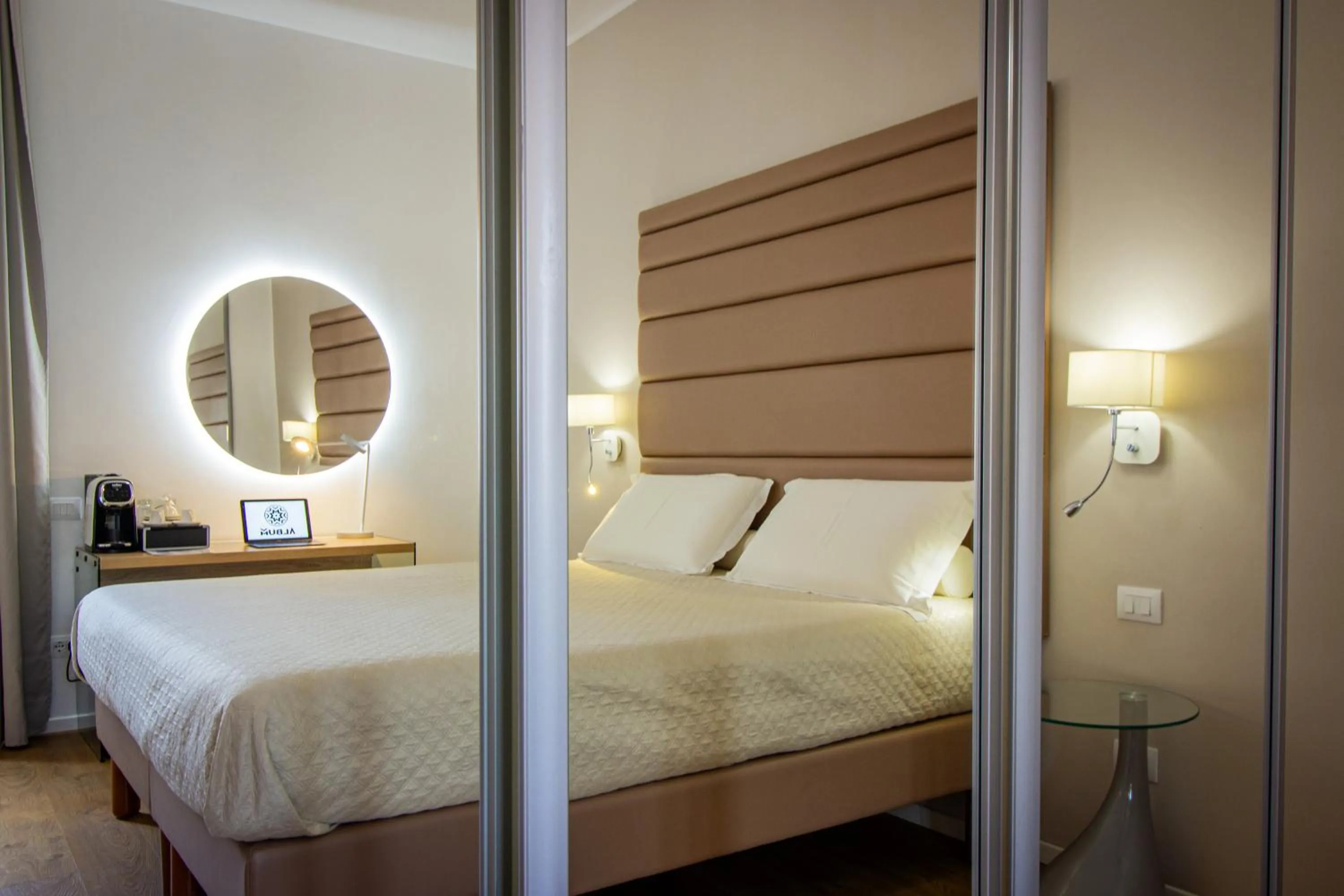 Photo of the whole room, Bed in Album Boutique Rooms