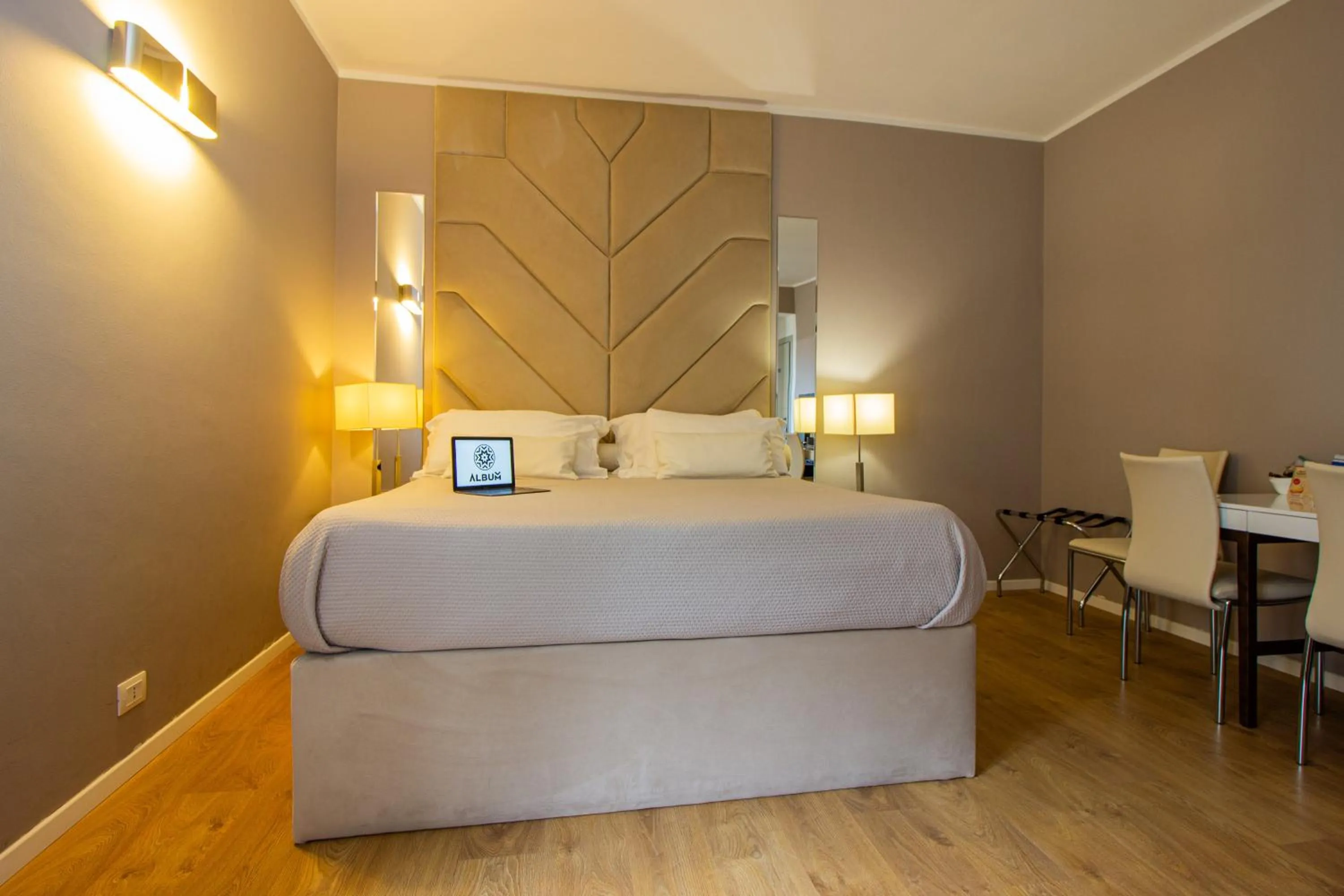 Bed in Album Boutique Rooms