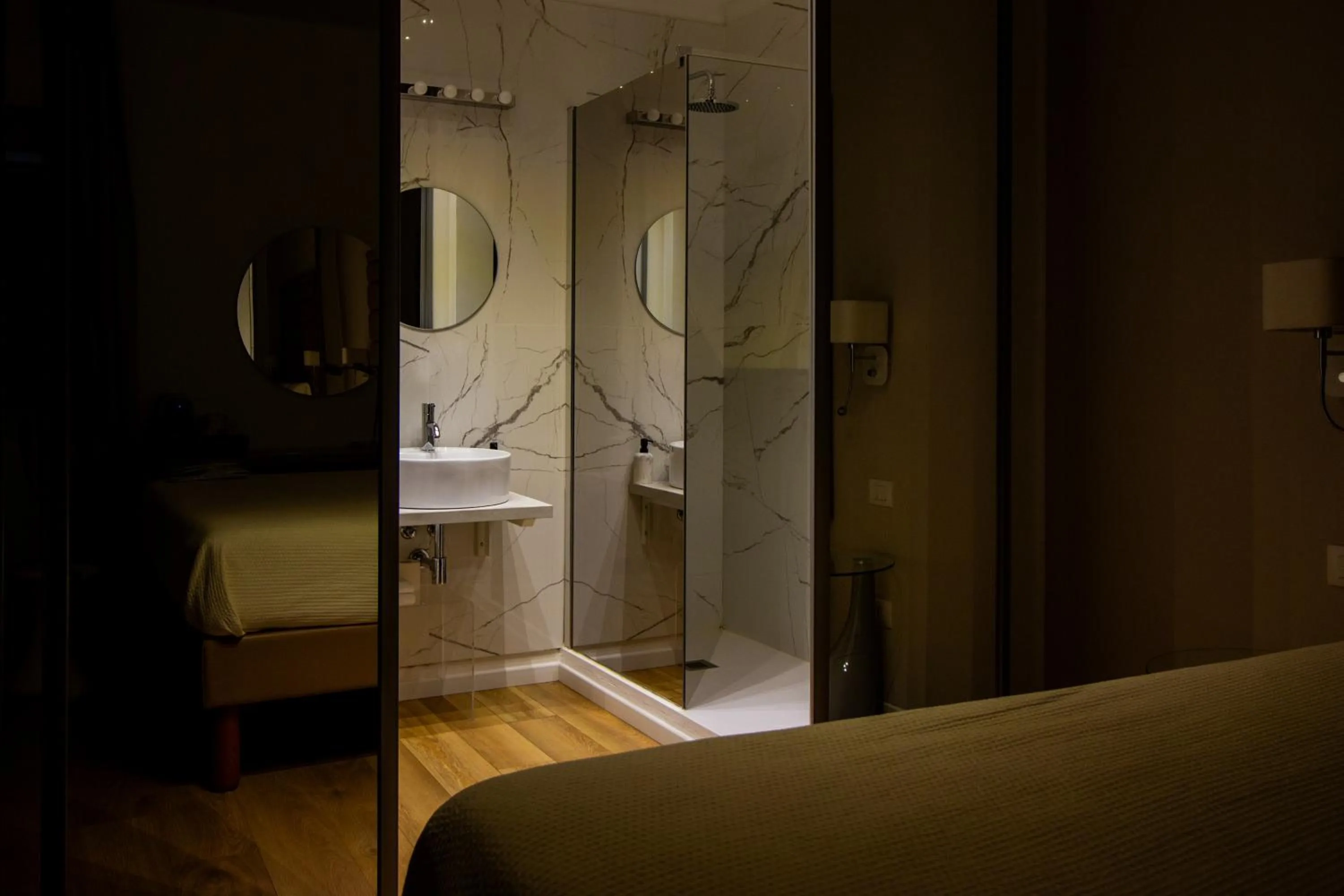Shower, Bed in Album Boutique Rooms