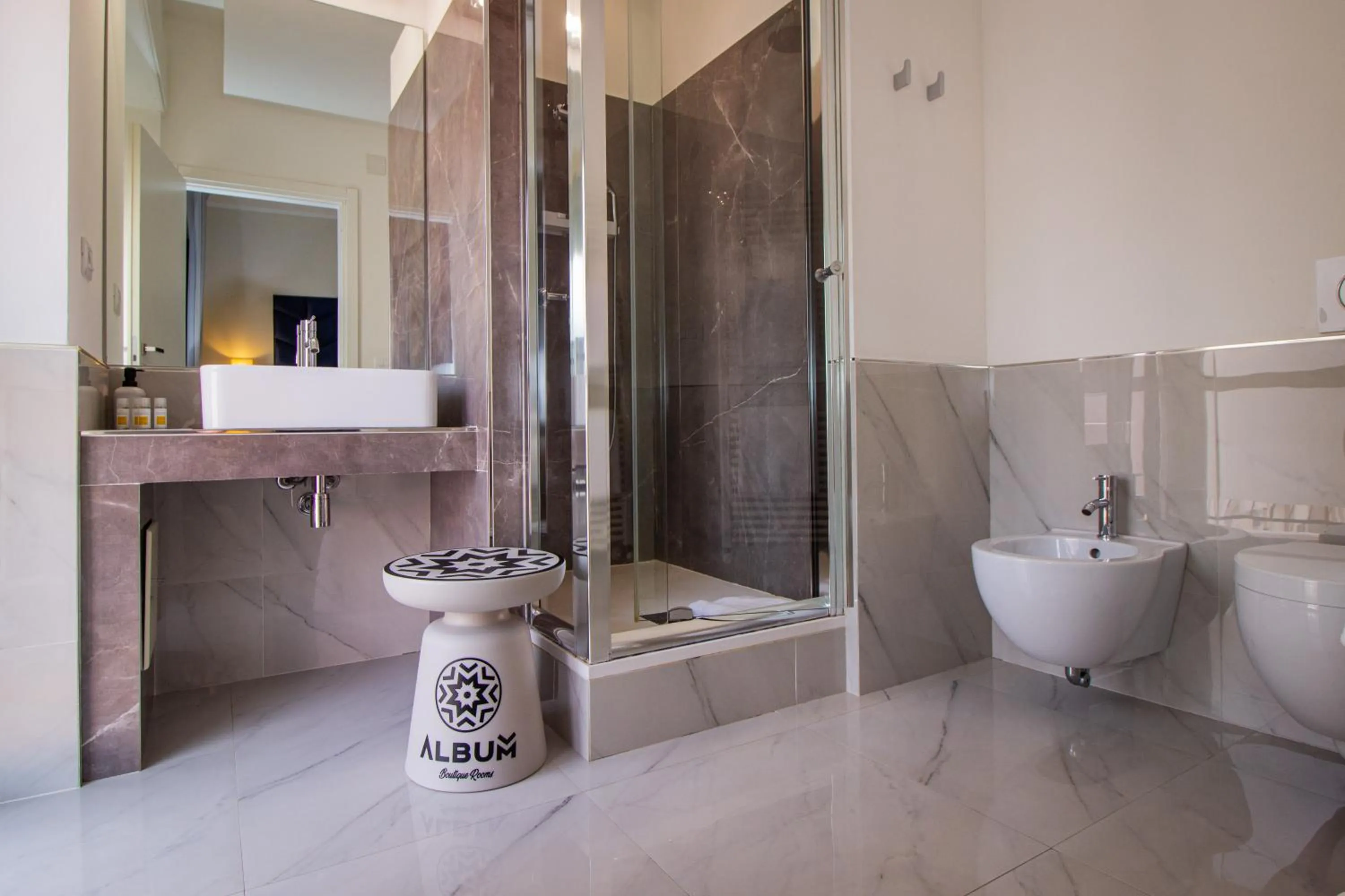 Toilet in Album Boutique Rooms