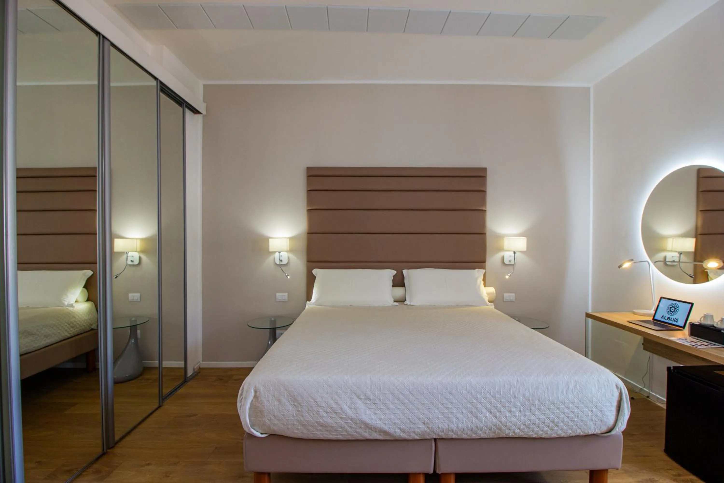 Bed in Album Boutique Rooms