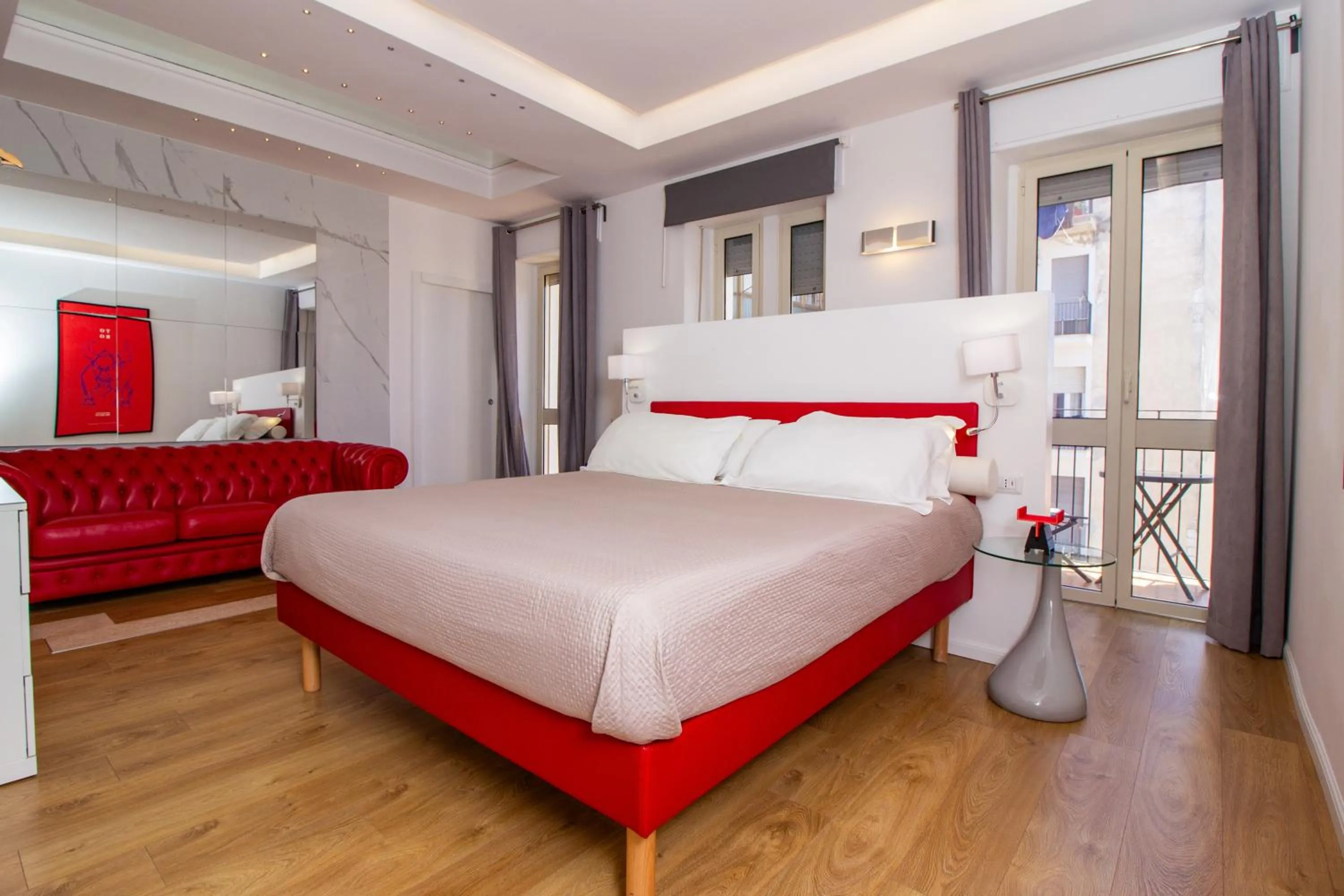 Photo of the whole room, Bed in Album Boutique Rooms