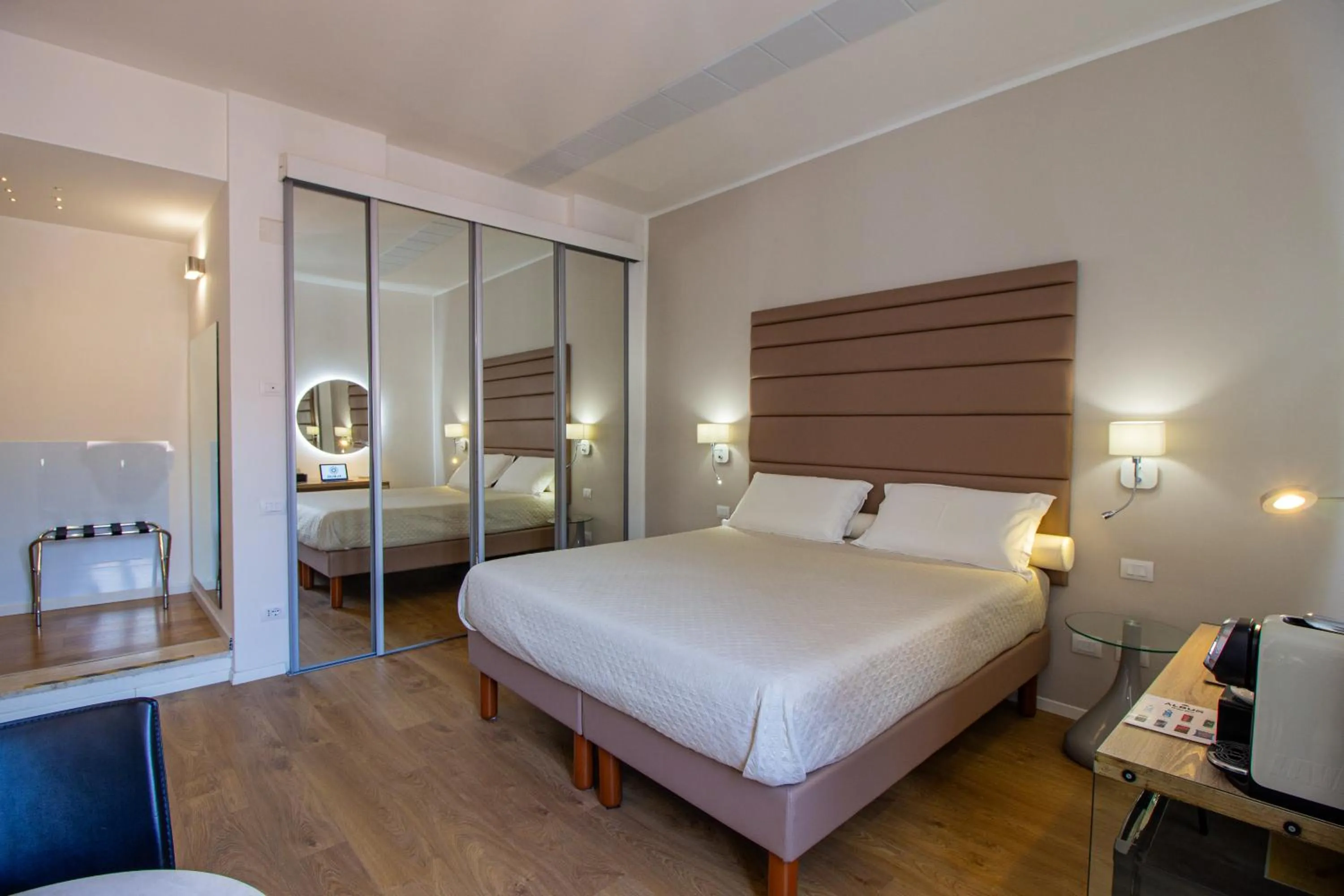 Bed in Album Boutique Rooms