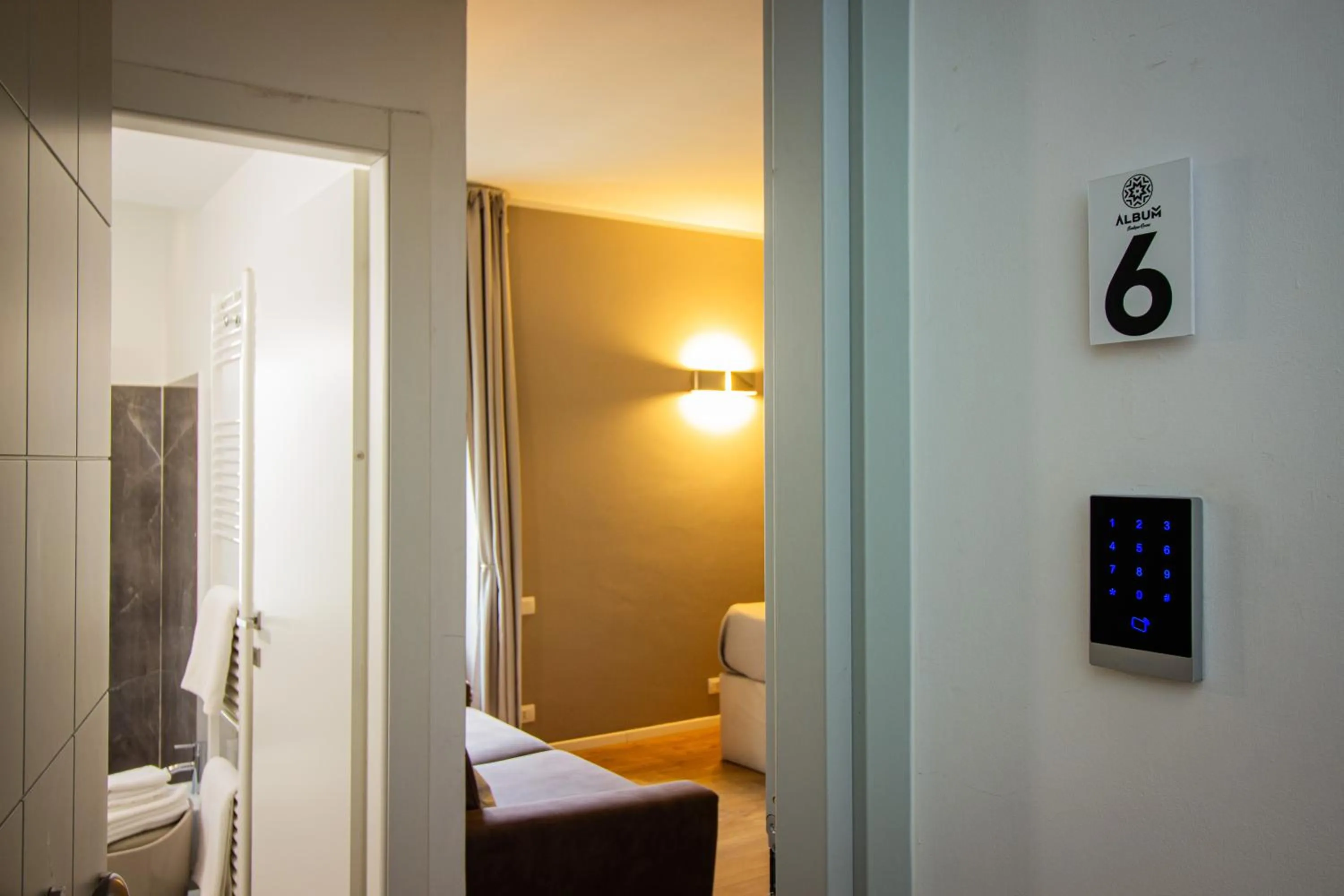 Photo of the whole room, Bed in Album Boutique Rooms