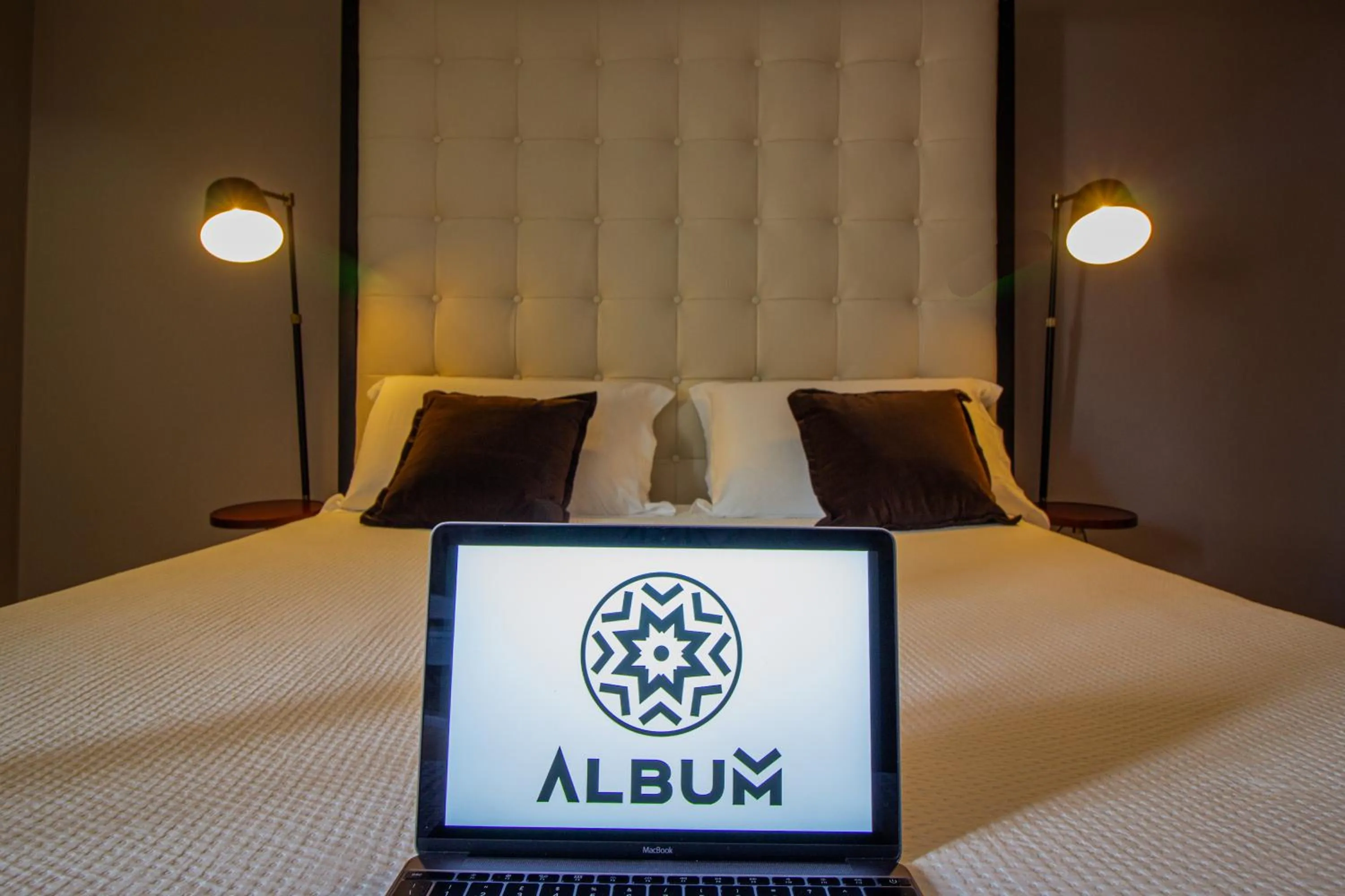 Bed in Album Boutique Rooms