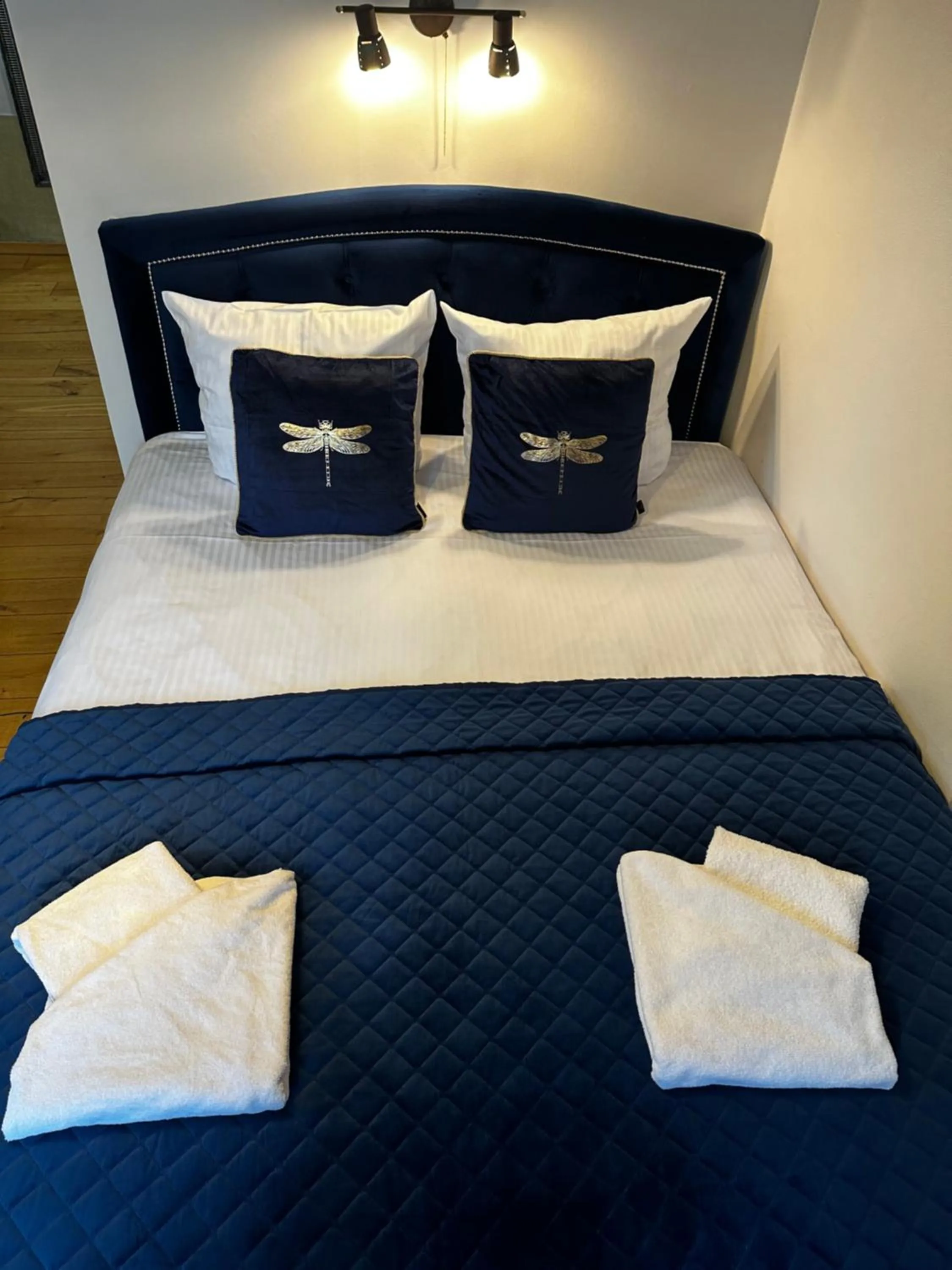 Bed in Dali ApartHOTEL