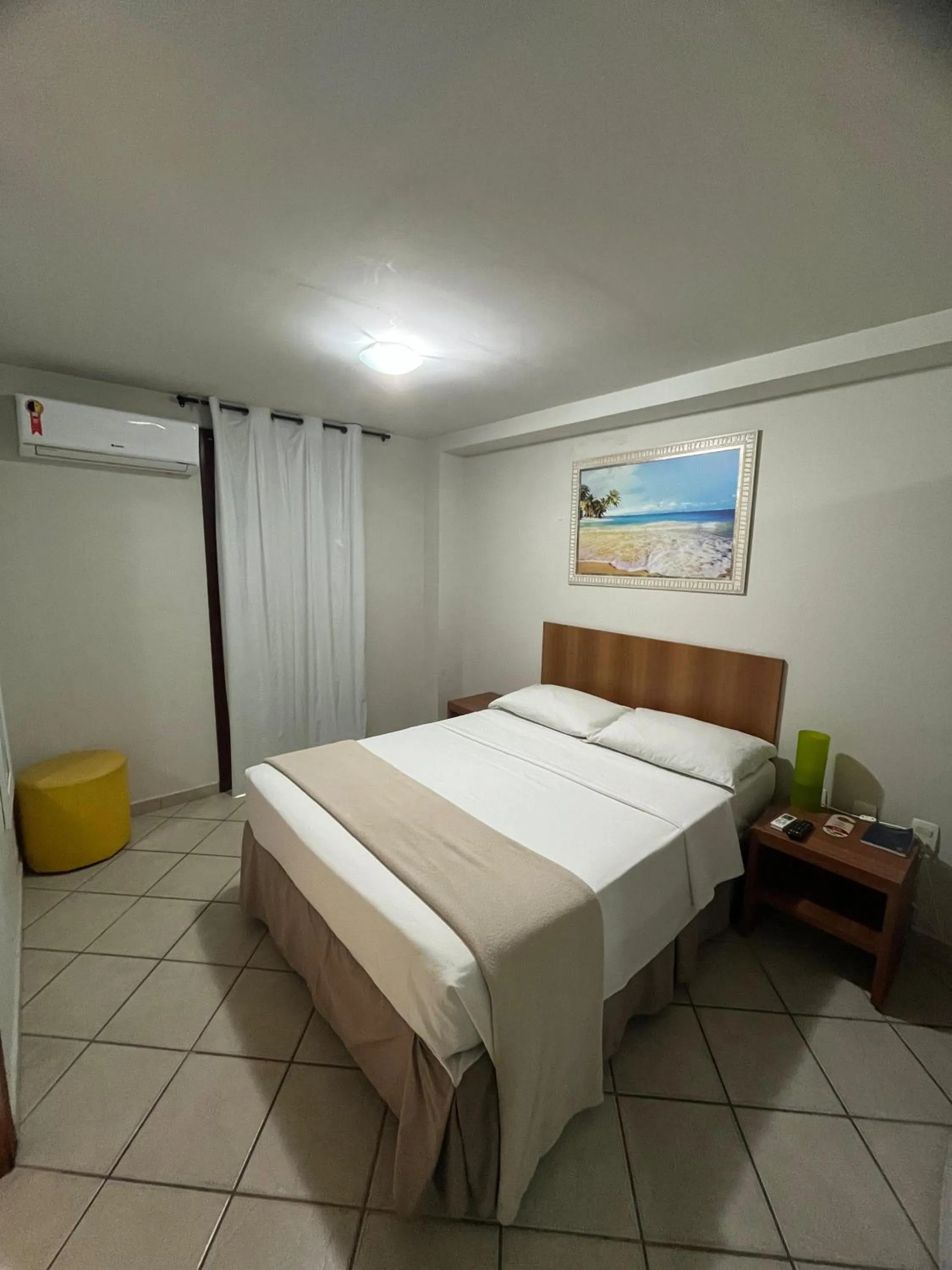 Bed in Pousada Laranja - Nova Administração