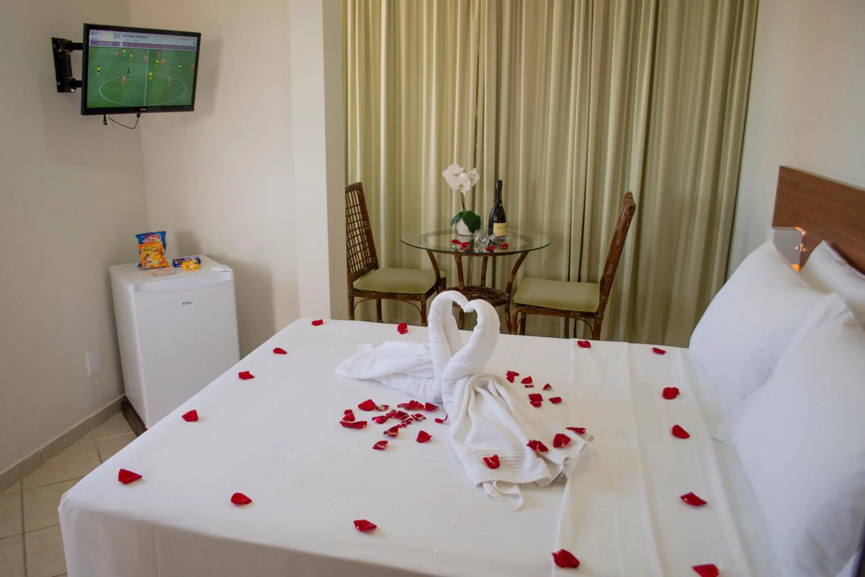 Bed in Pousada Laranja - Nova Administração