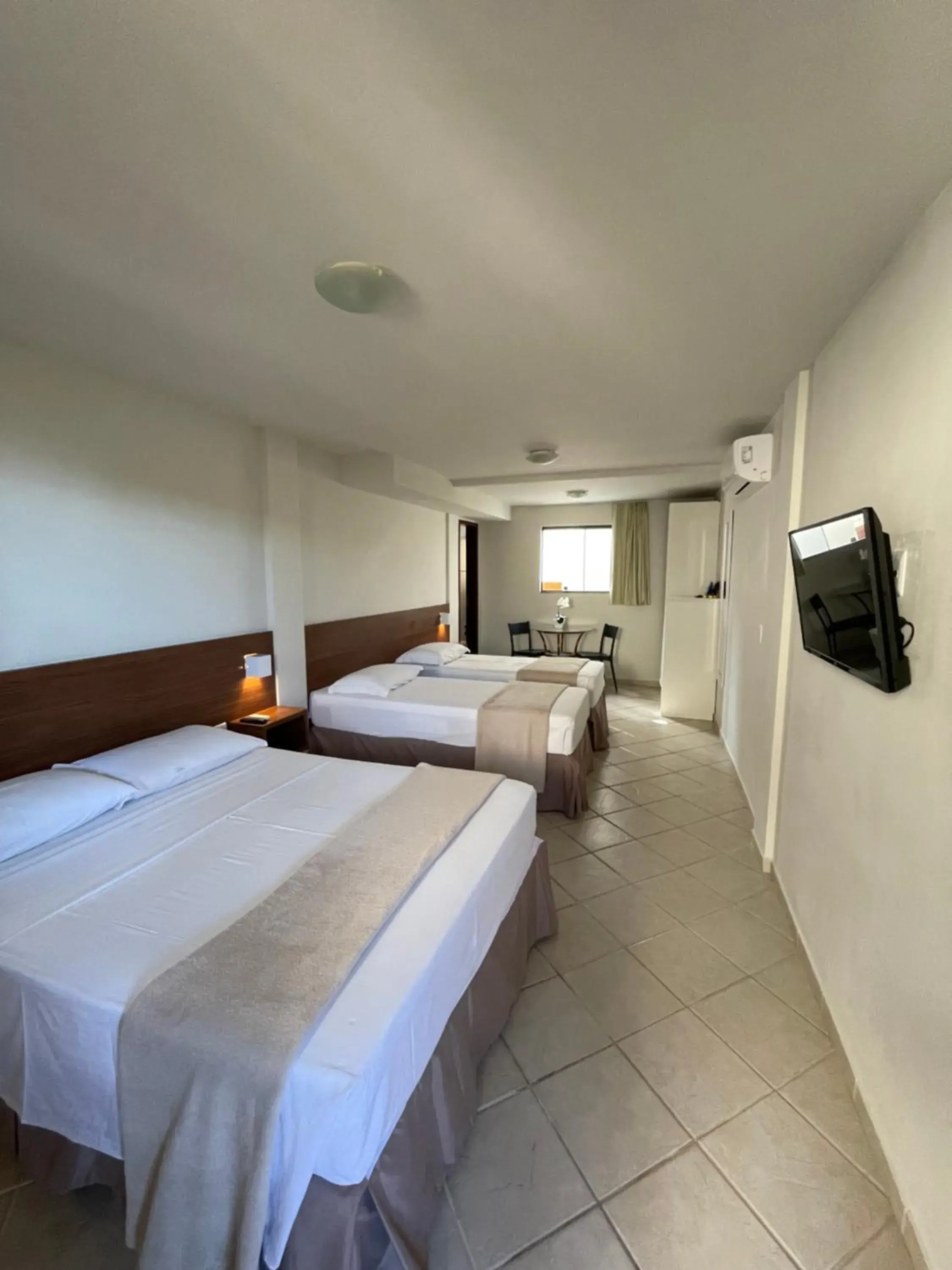 Standard Triple Room in Pousada Laranja - Nova Administração Standard Triple Room in Pousada Laranja - Nova Administração