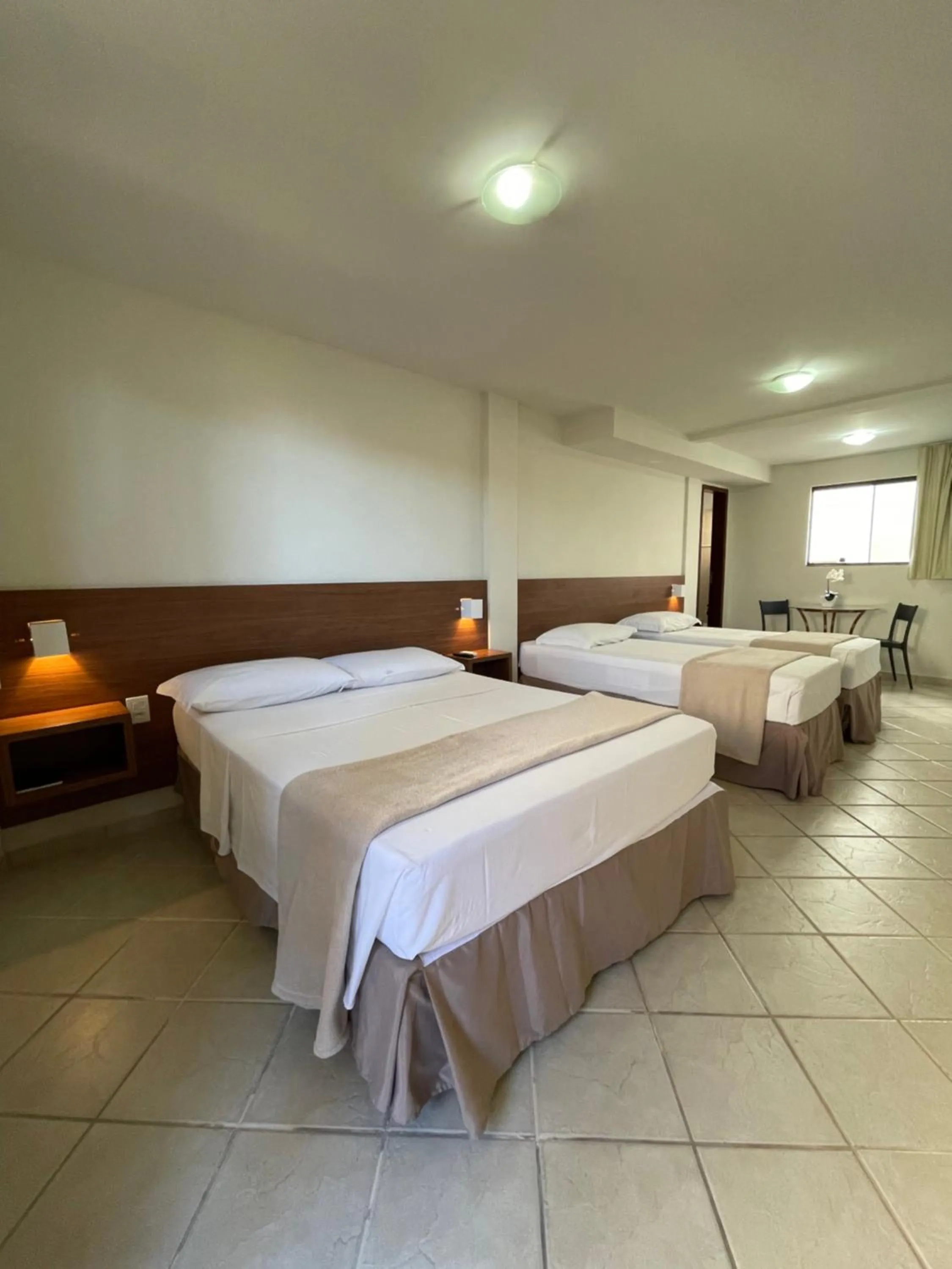 Bed in Pousada Laranja - Nova Administração