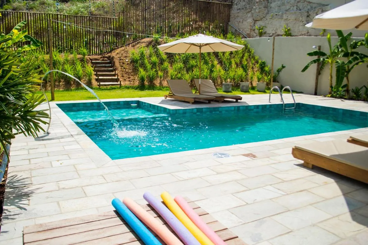 Swimming pool in Pousada Laranja - Nova Administração