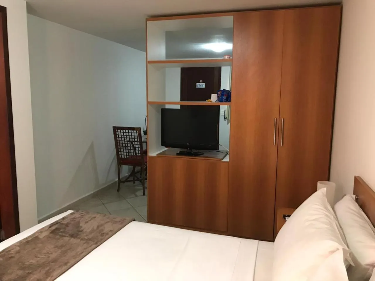 Bed in Pousada Laranja - Nova Administração