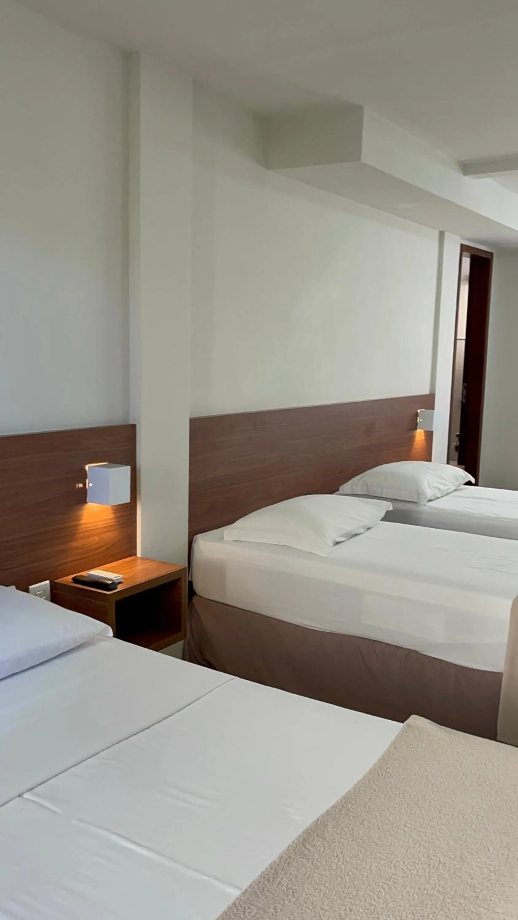 Bed in Pousada Laranja - Nova Administração