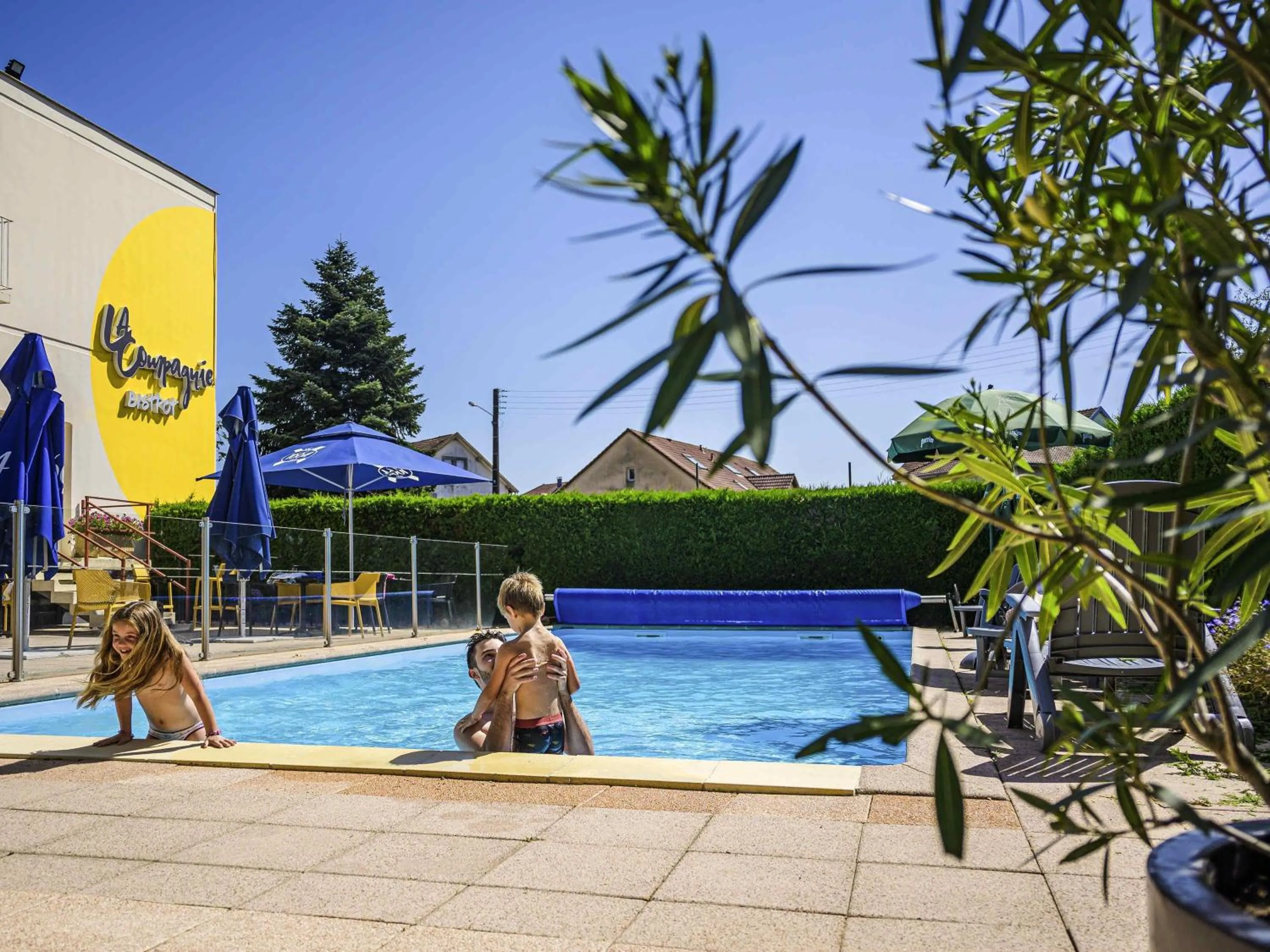 Pool view in ibis Belfort Danjoutin