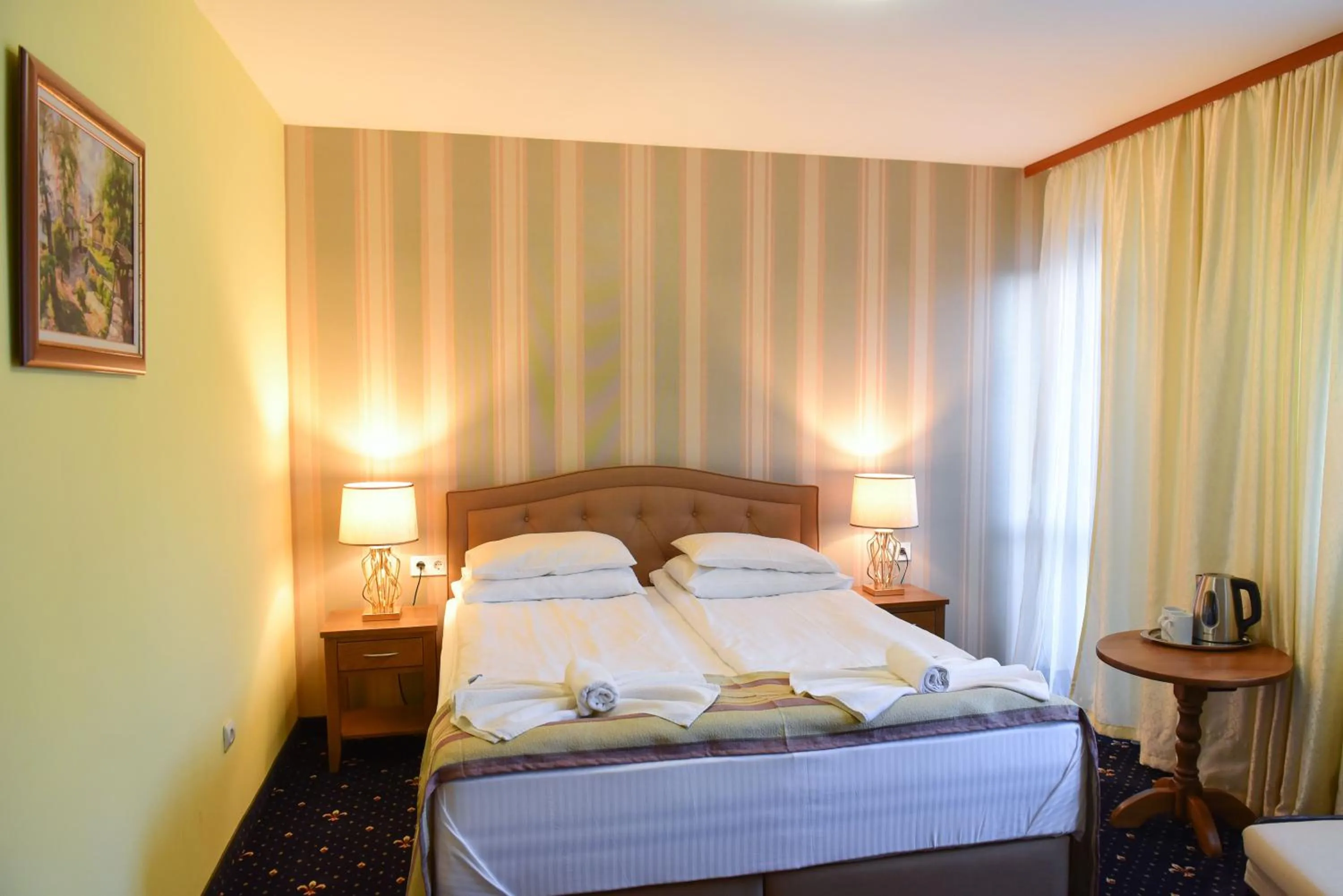 Bed in Family Hotel Lazur