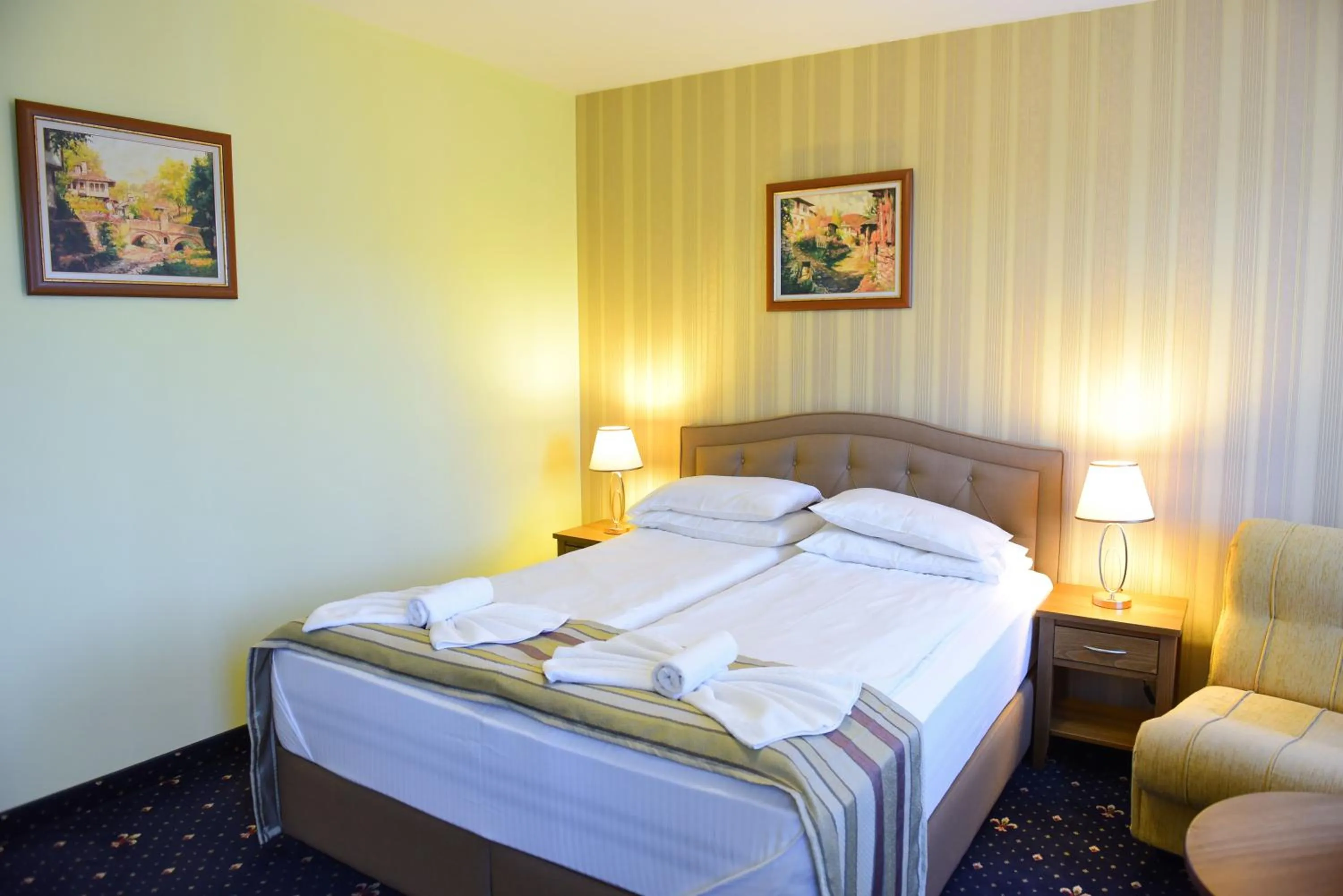 Bed in Family Hotel Lazur