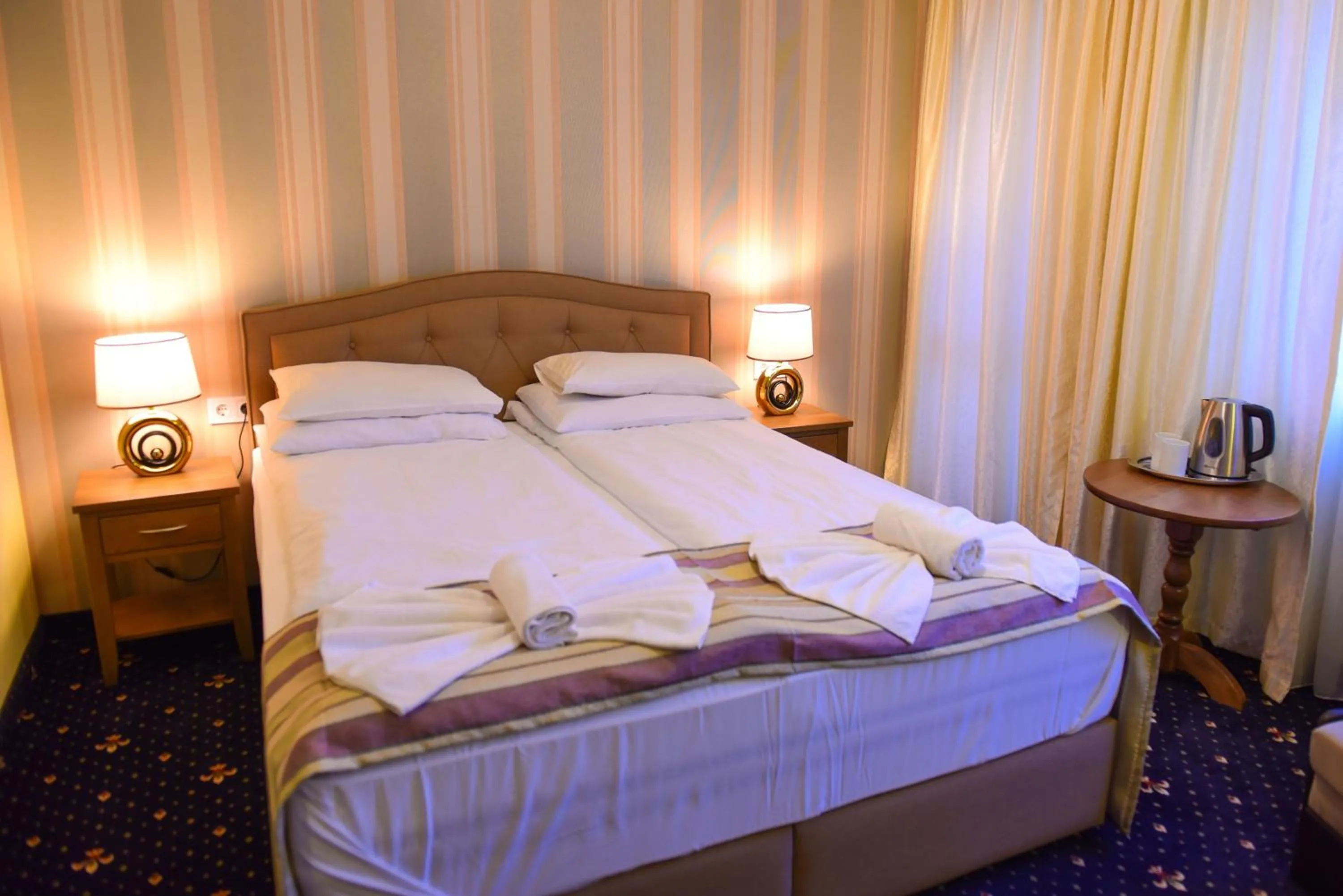 Bed in Family Hotel Lazur