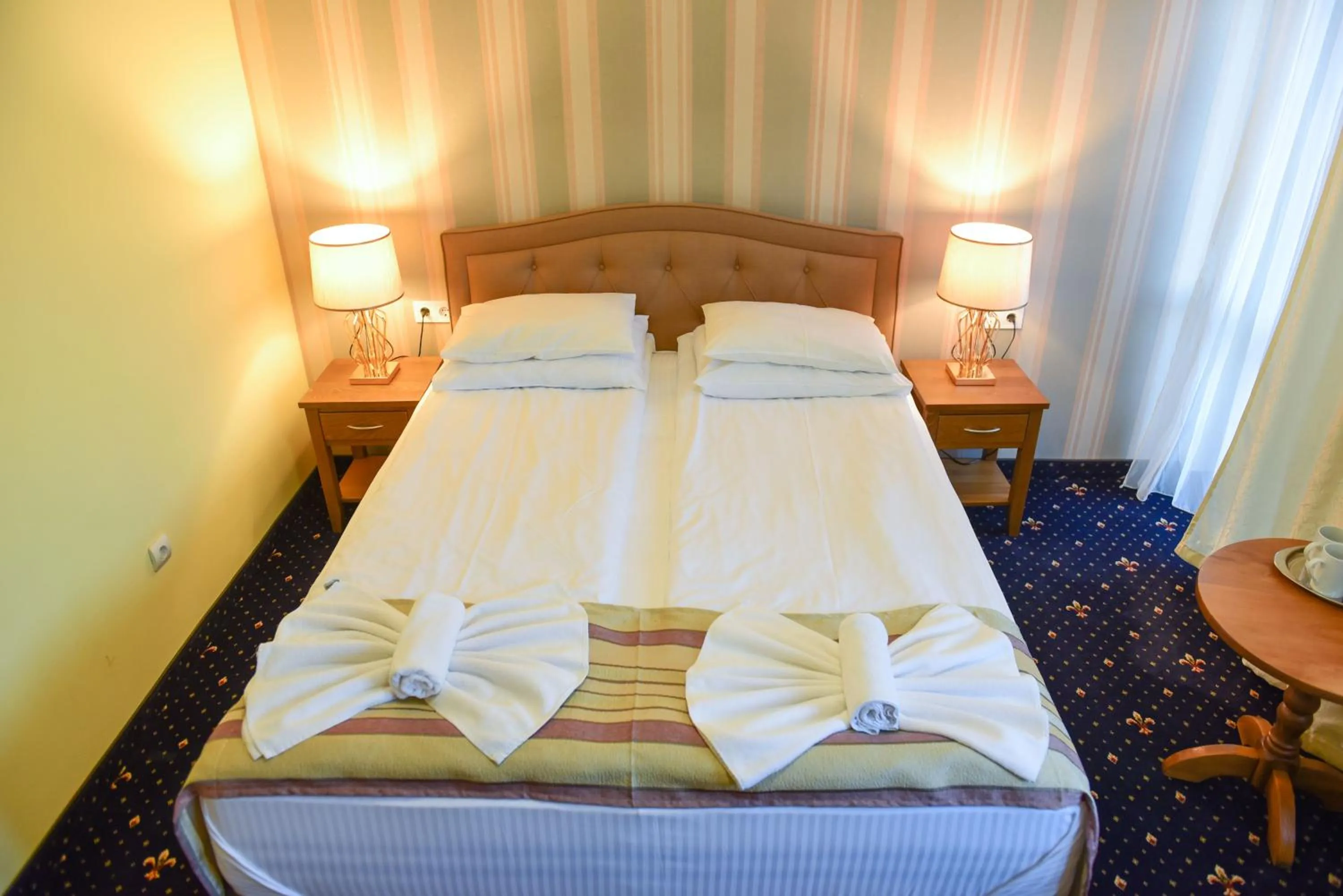 Bed in Family Hotel Lazur