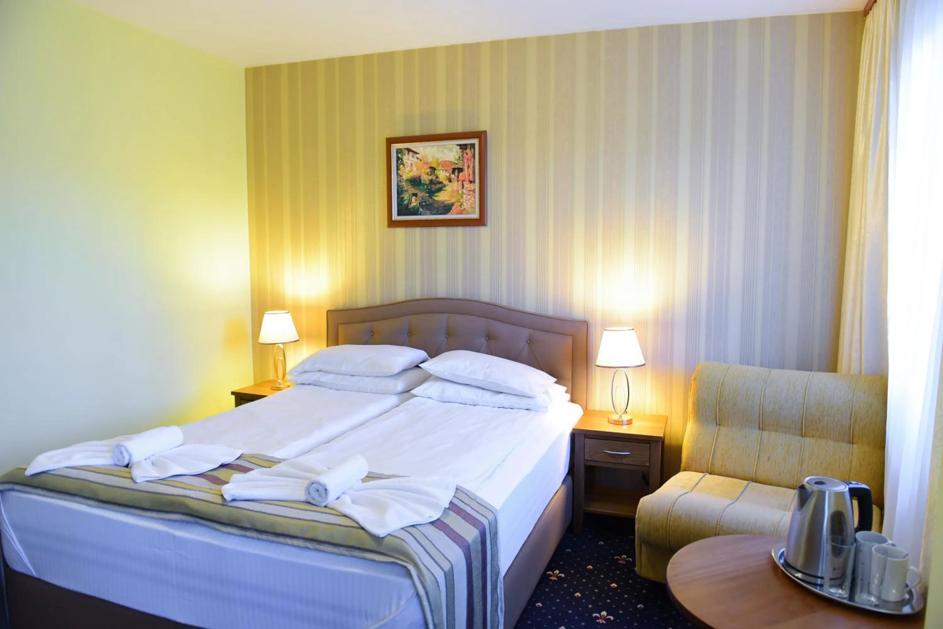 Bed in Family Hotel Lazur