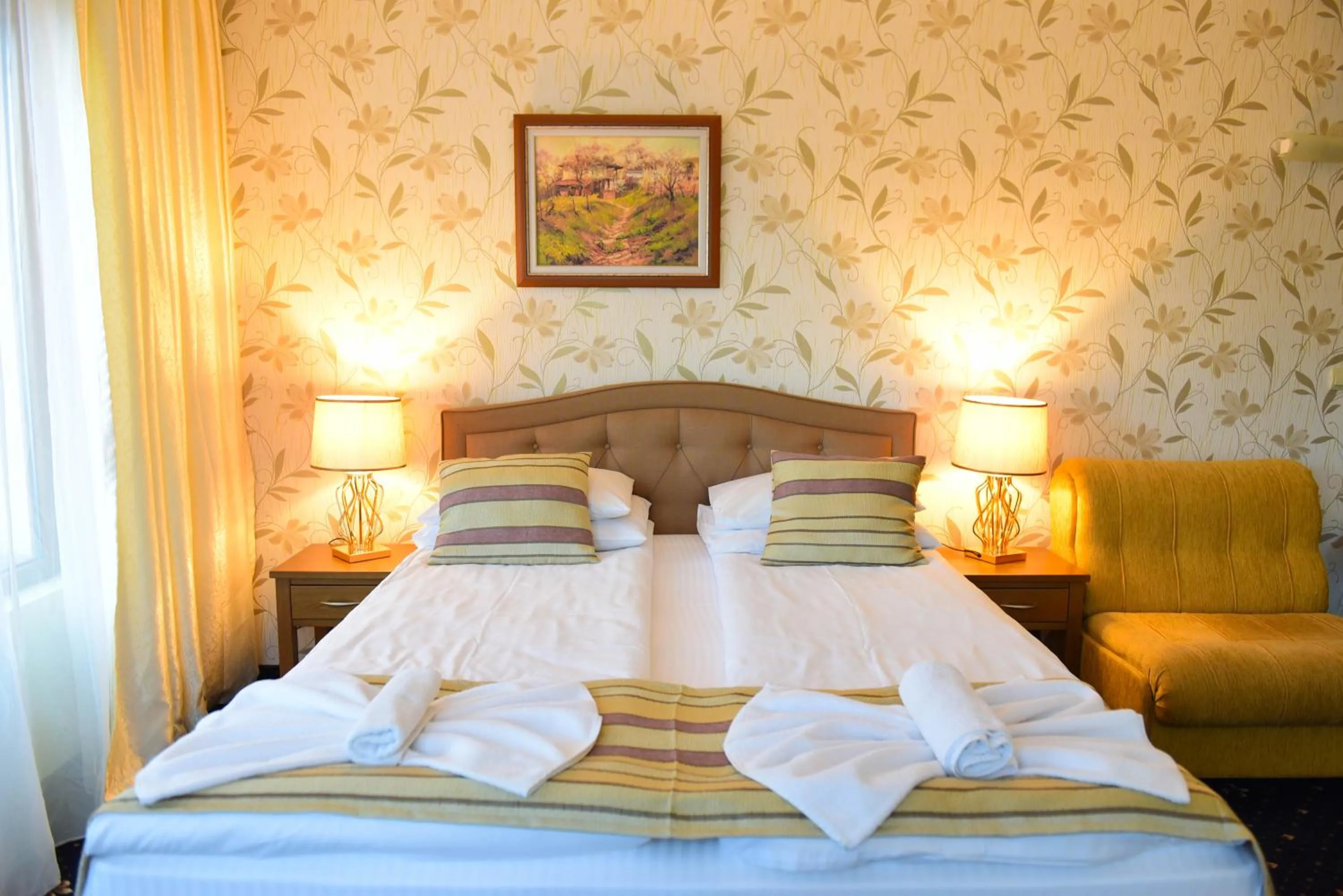 Bed in Family Hotel Lazur