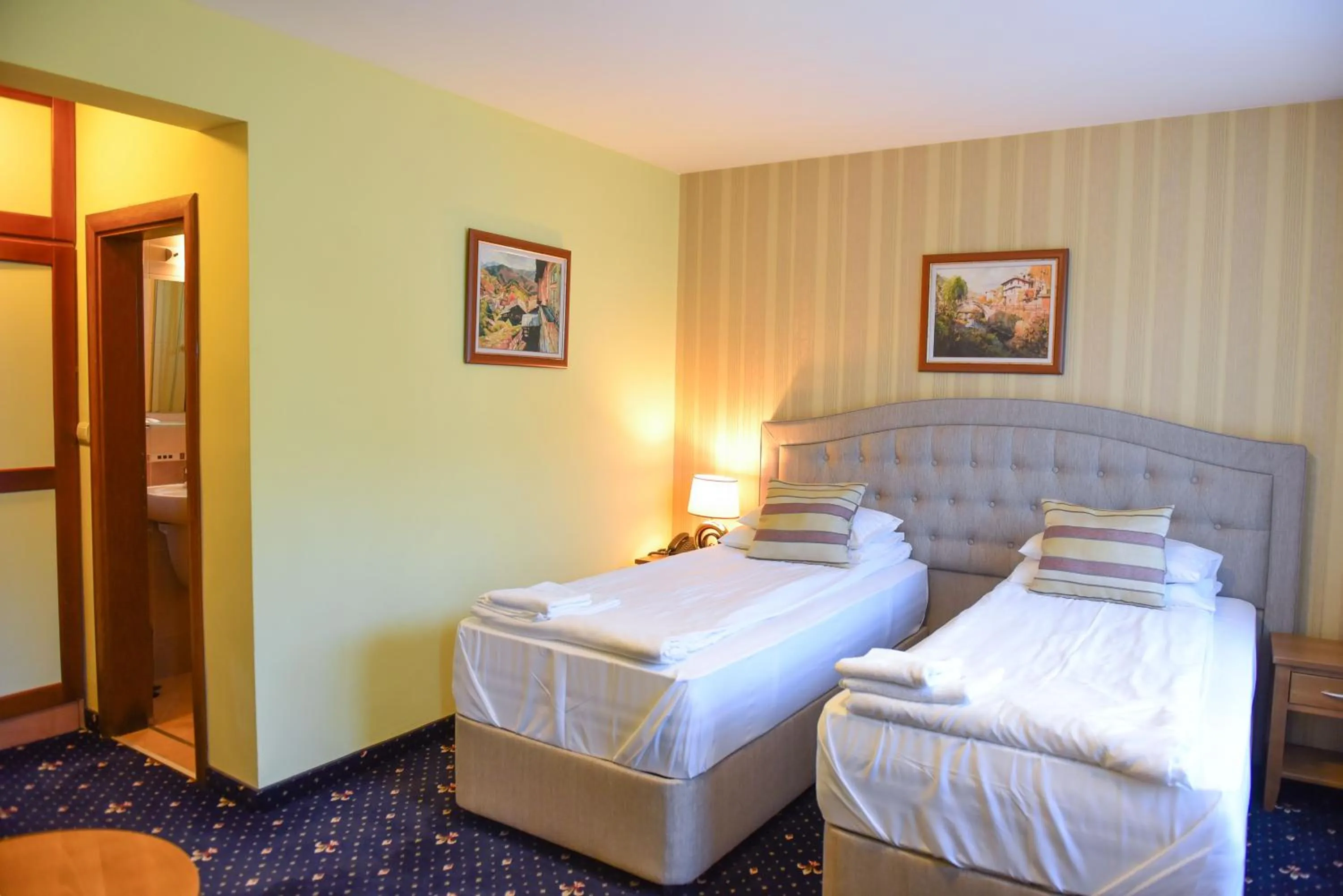 Bed in Family Hotel Lazur