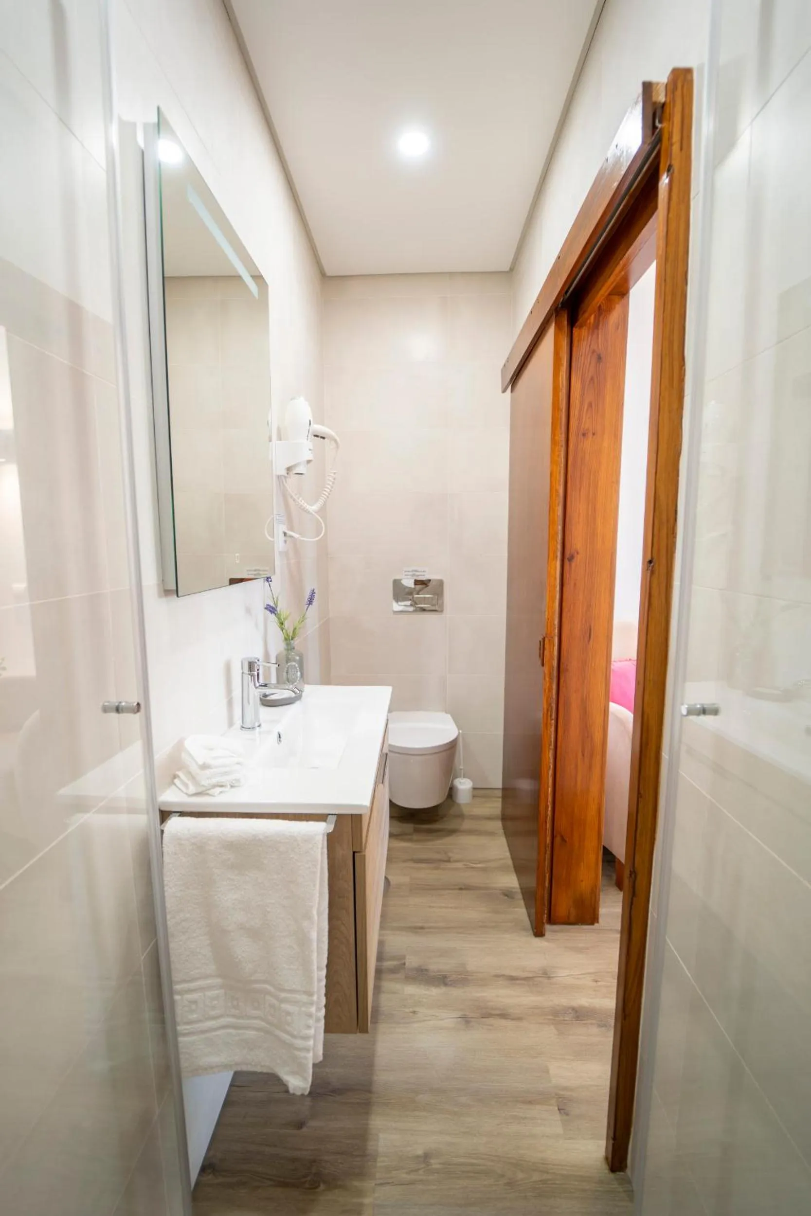 Bathroom in Apartamentos Flor da Laranja, Albufeira by AlgarveBlossom