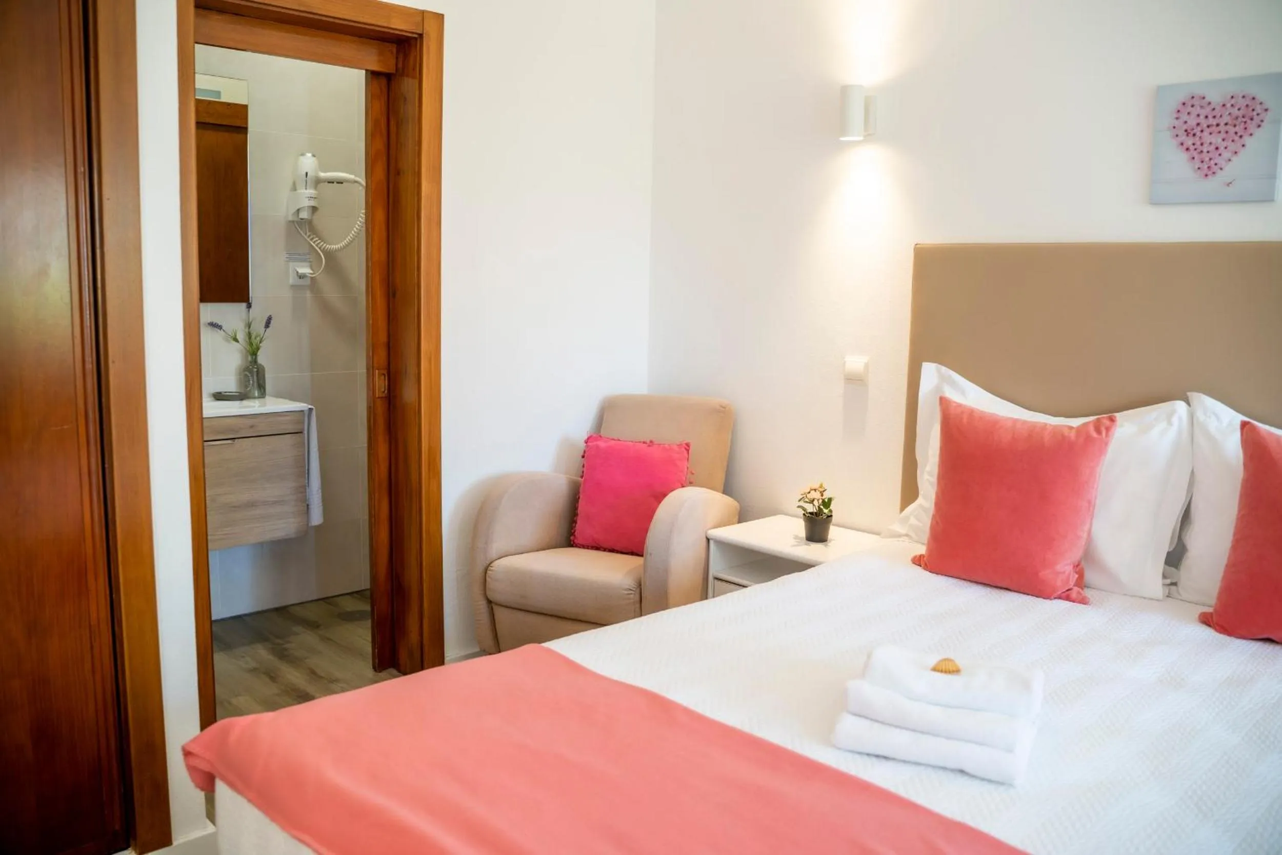 Bed in Apartamentos Flor da Laranja, Albufeira by AlgarveBlossom