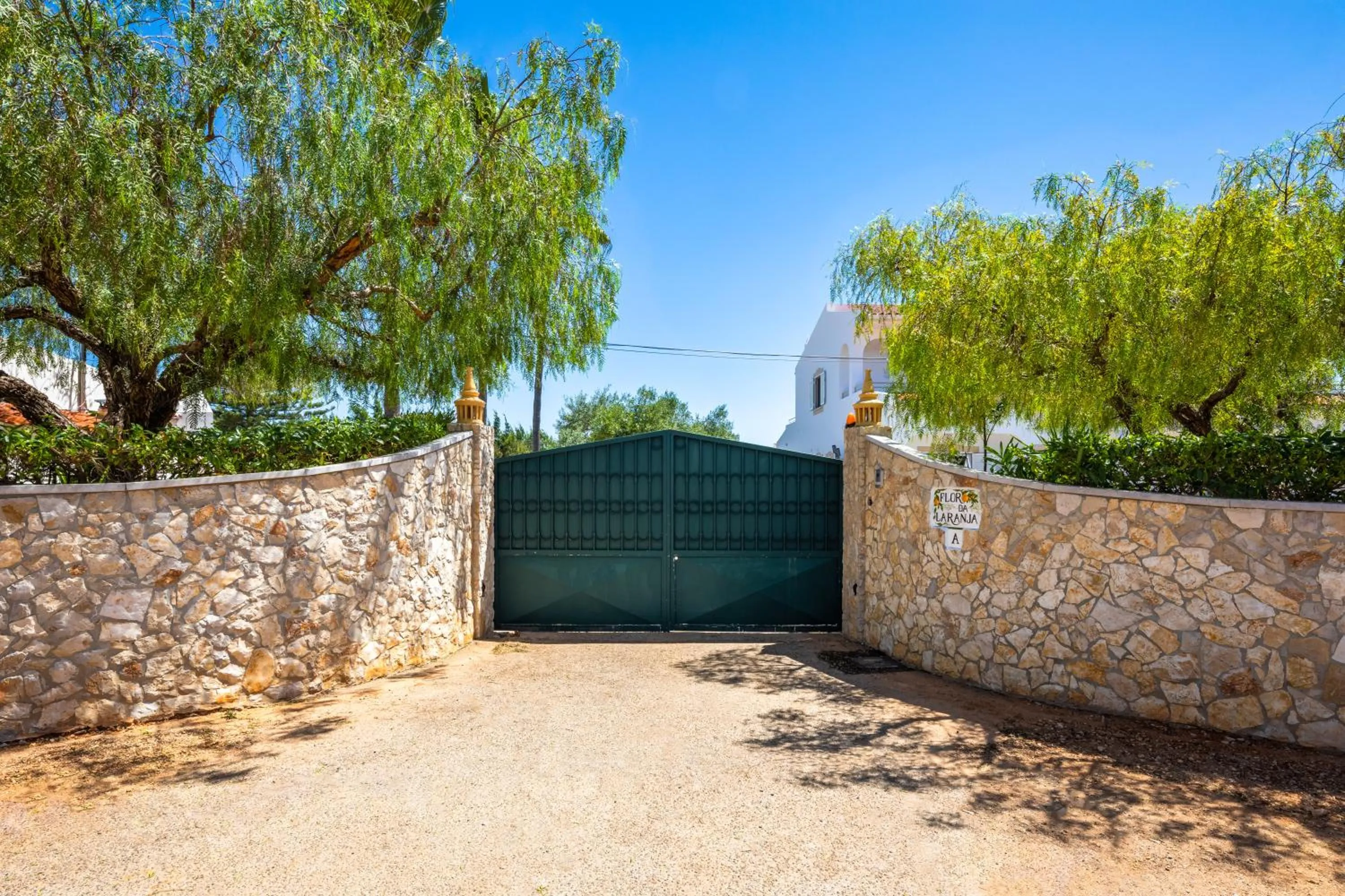 Facade/entrance in Apartamentos Flor da Laranja, Albufeira by AlgarveBlossom