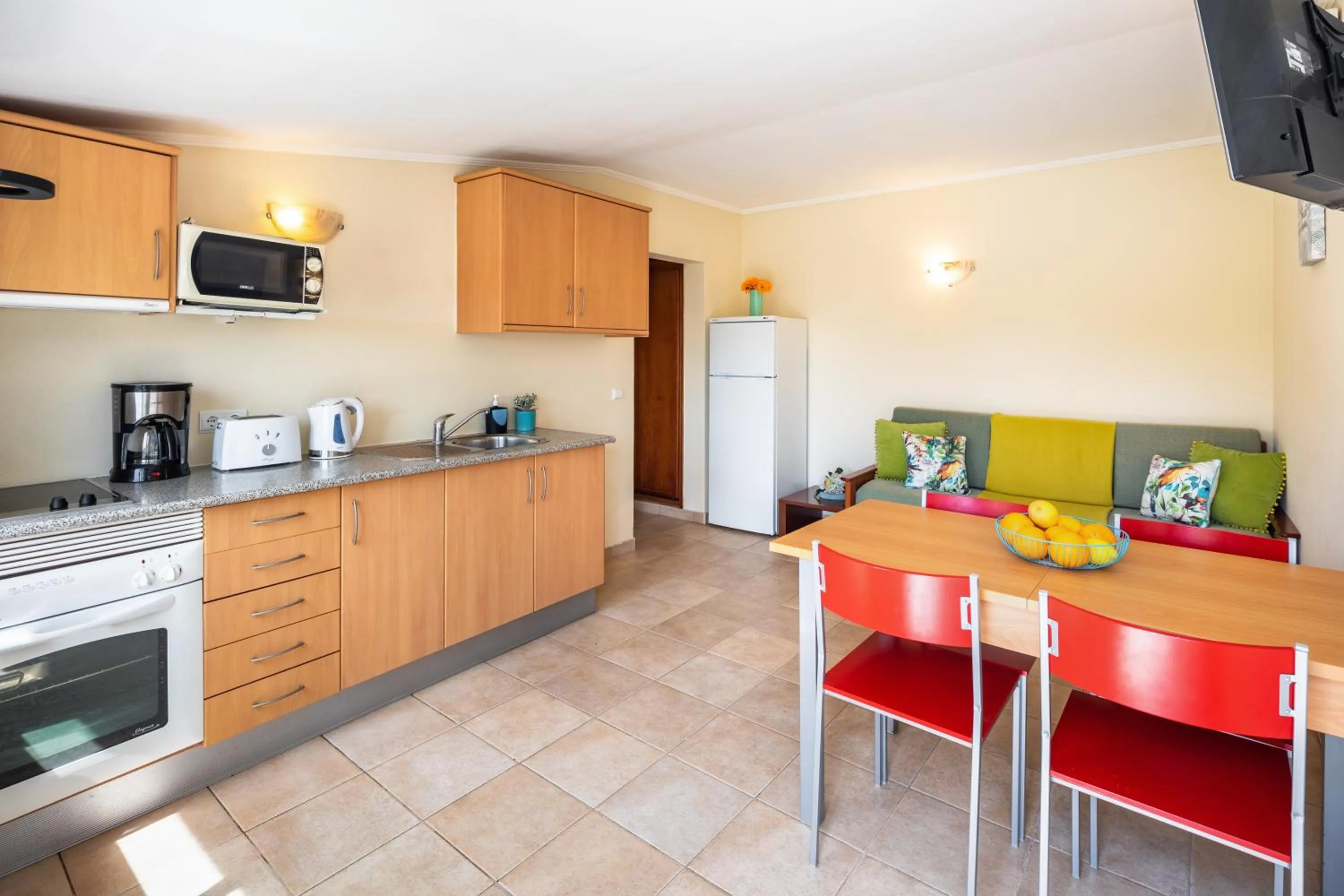 Kitchen or kitchenette in Apartamentos Flor da Laranja, Albufeira by AlgarveBlossom