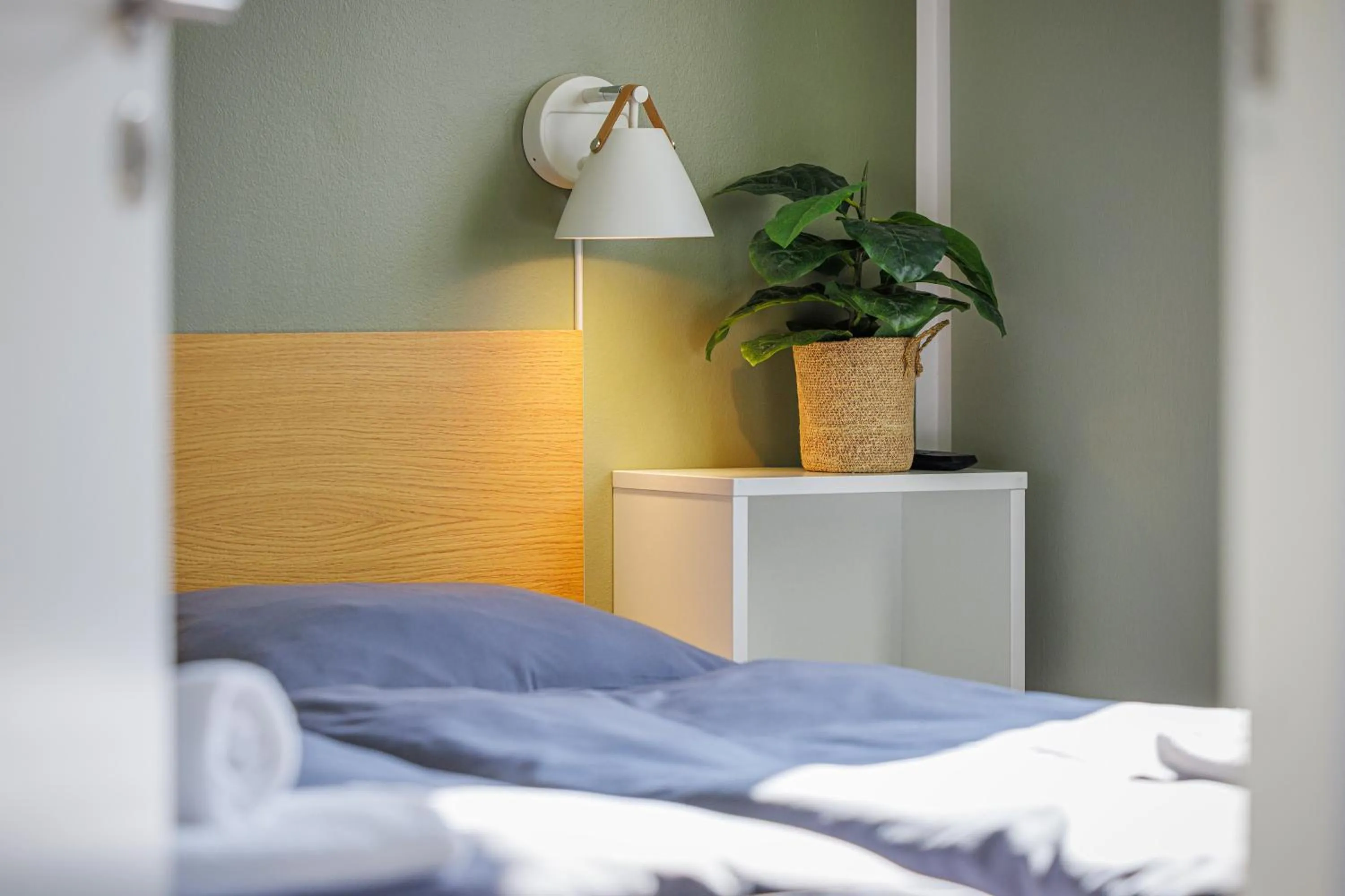 Bed in Aalborg Hotel Apartments