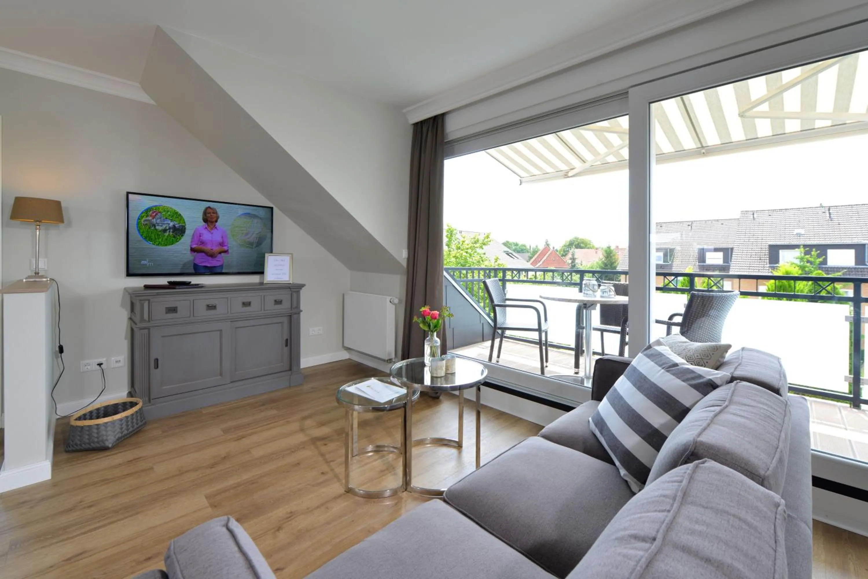 Communal lounge/ TV room in Kurhotel Drei Birken