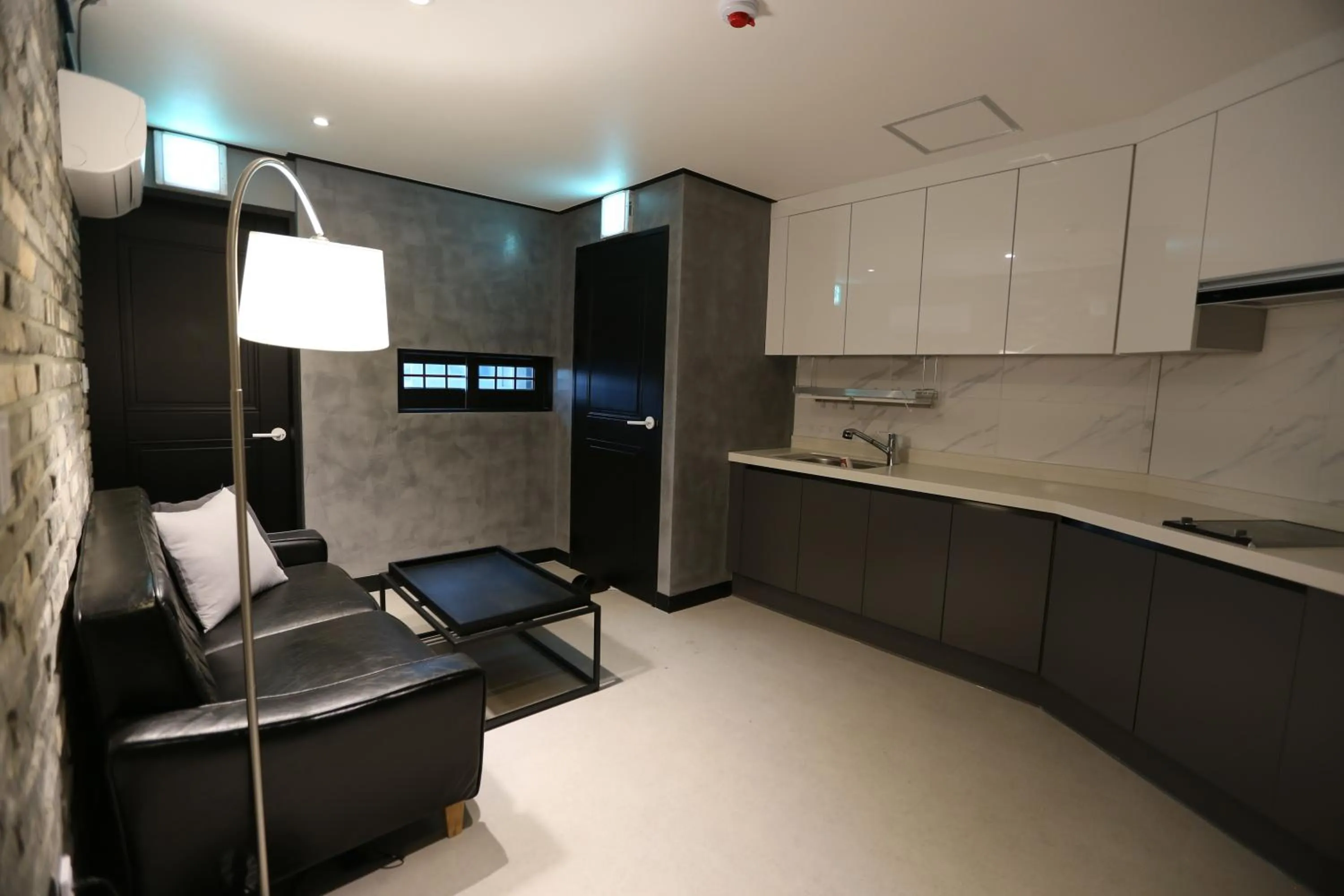 Kitchen/Kitchenette in almond hotel Gupo station