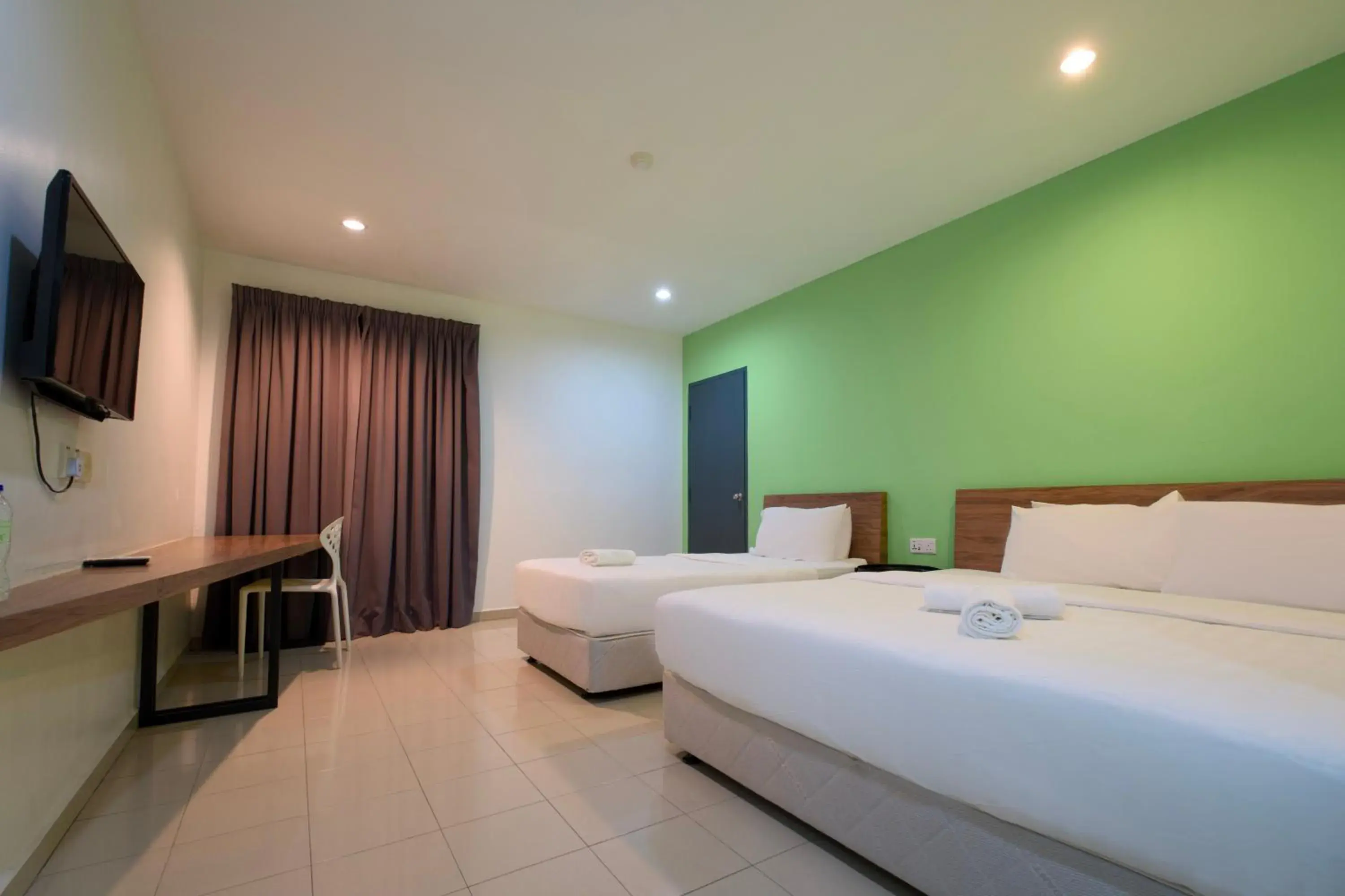 Superior Triple Room in T Hotel Changlun Superior Triple Room in T Hotel Changlun