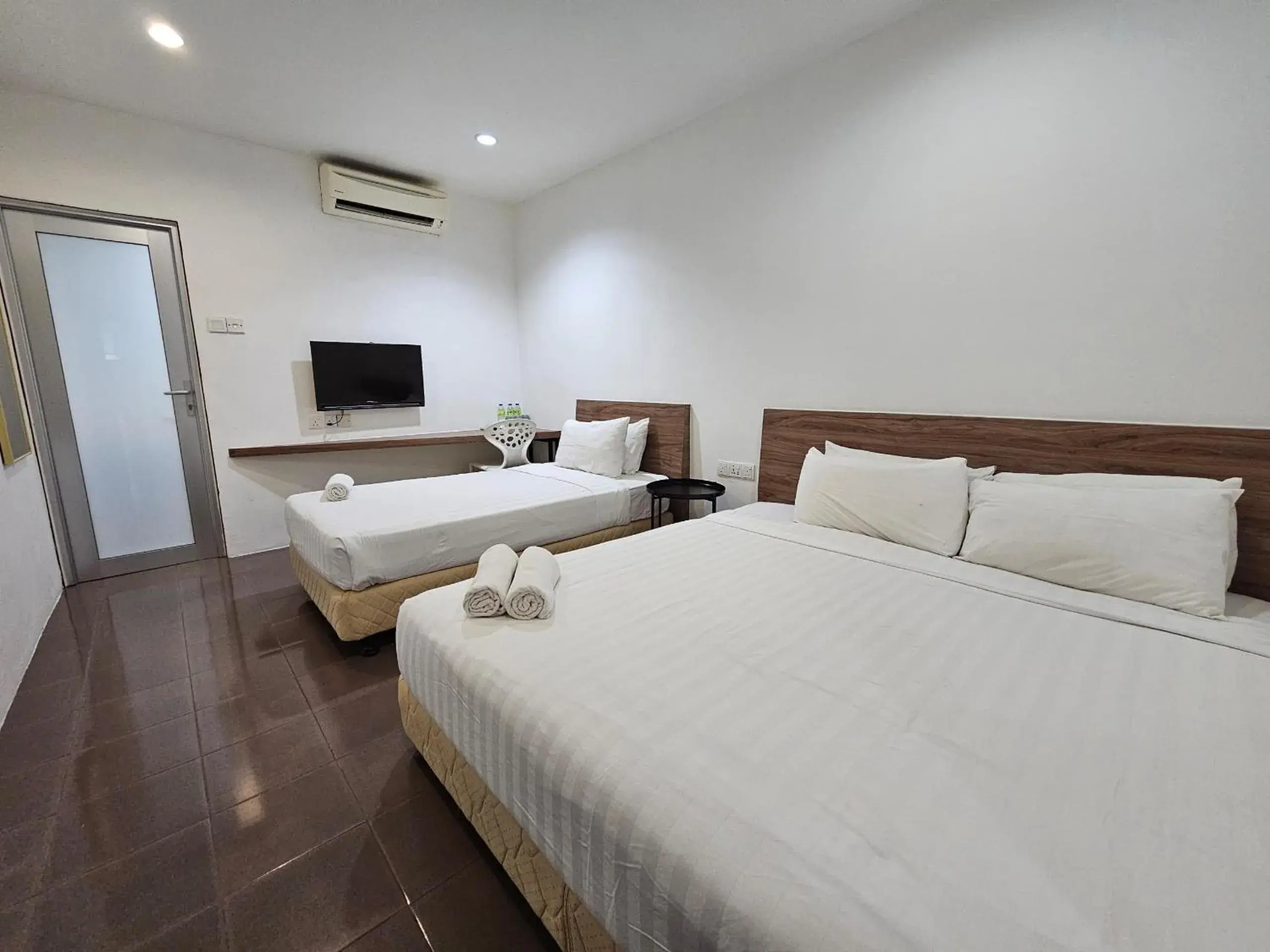 Standard Triple Room in T Hotel Tandop Standard Triple Room in T Hotel Tandop