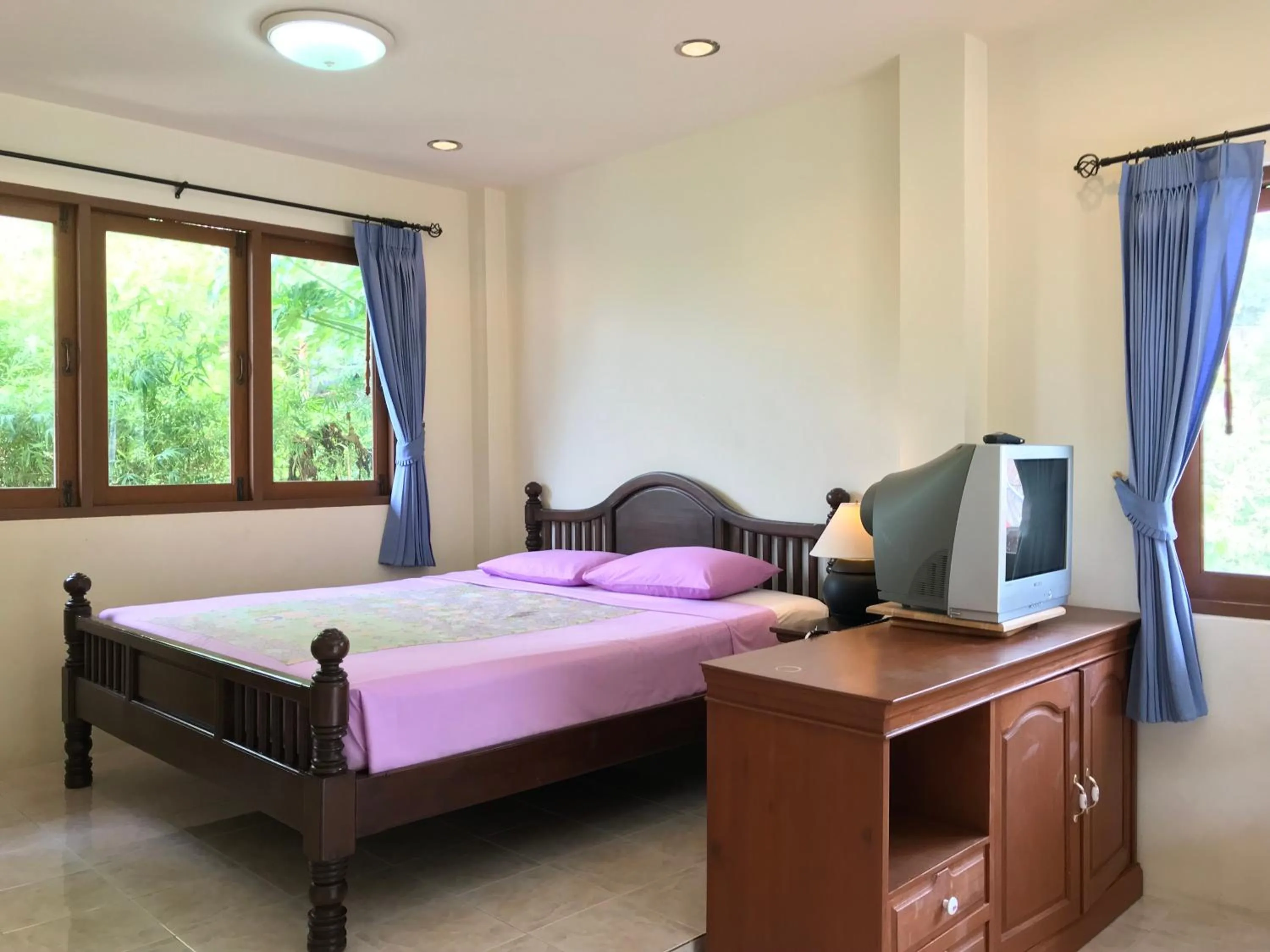 Bed in Sunrise Bungalow