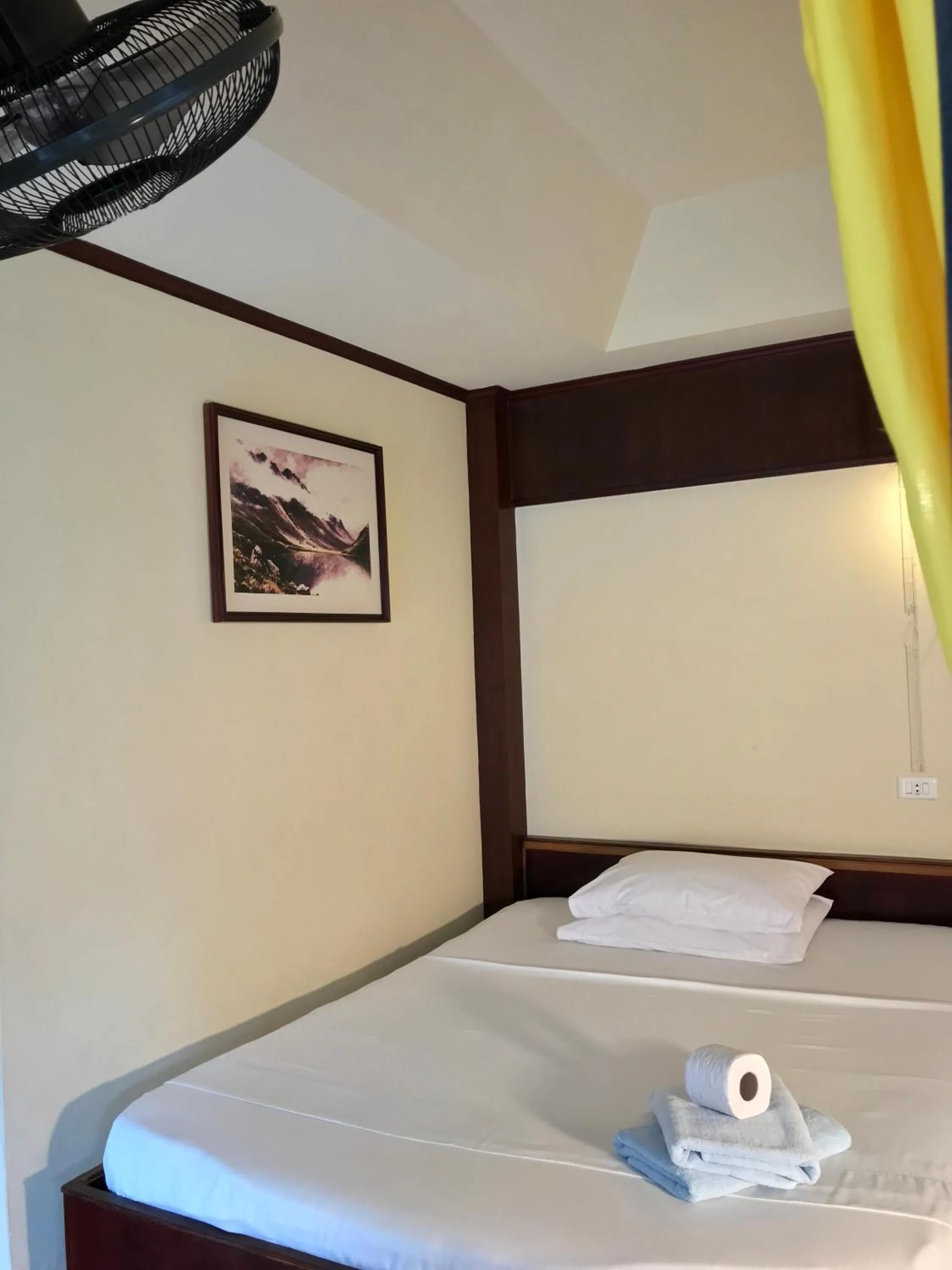 Bed in Sunrise Bungalow