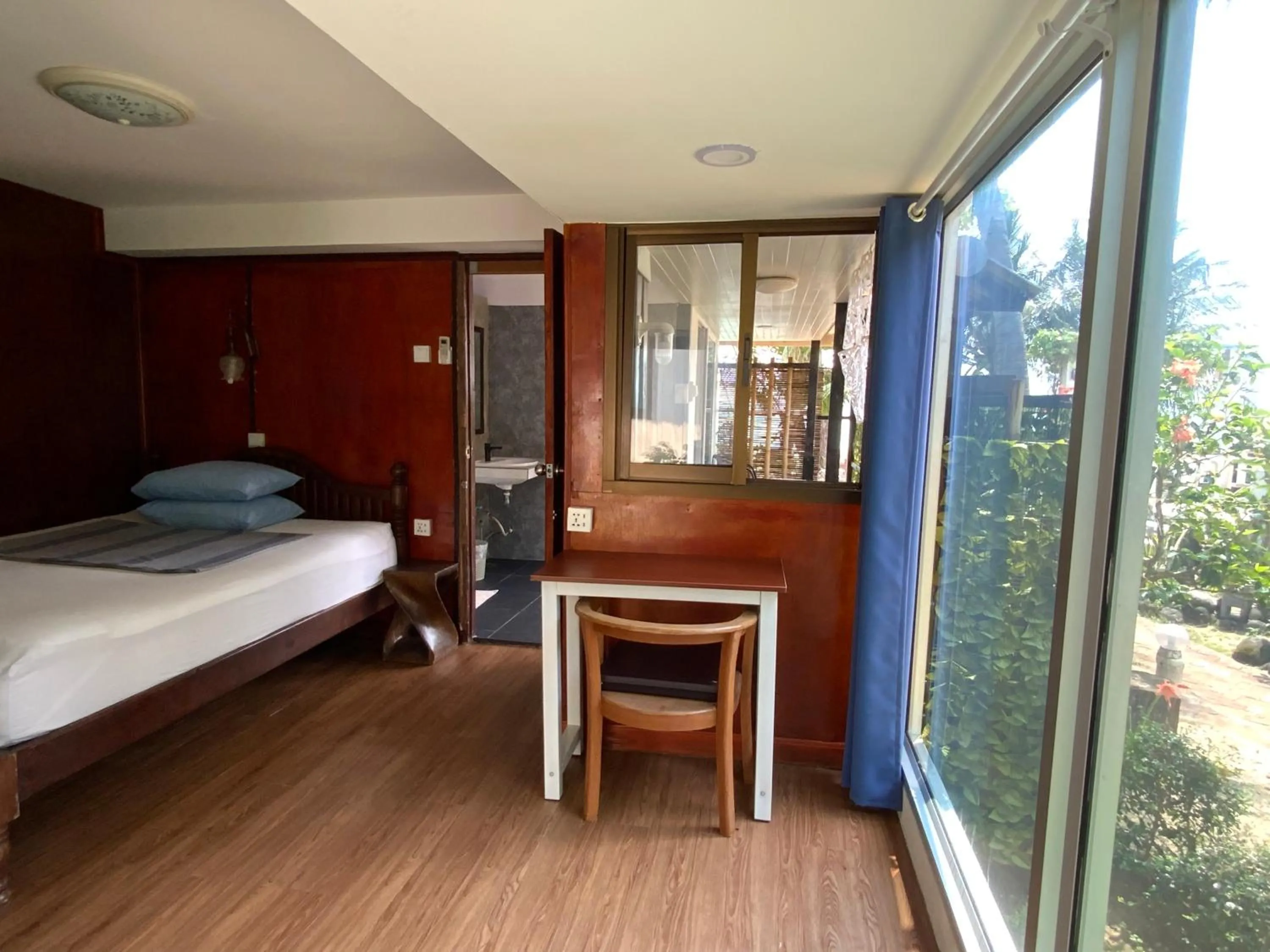 Bed in Sunrise Bungalow