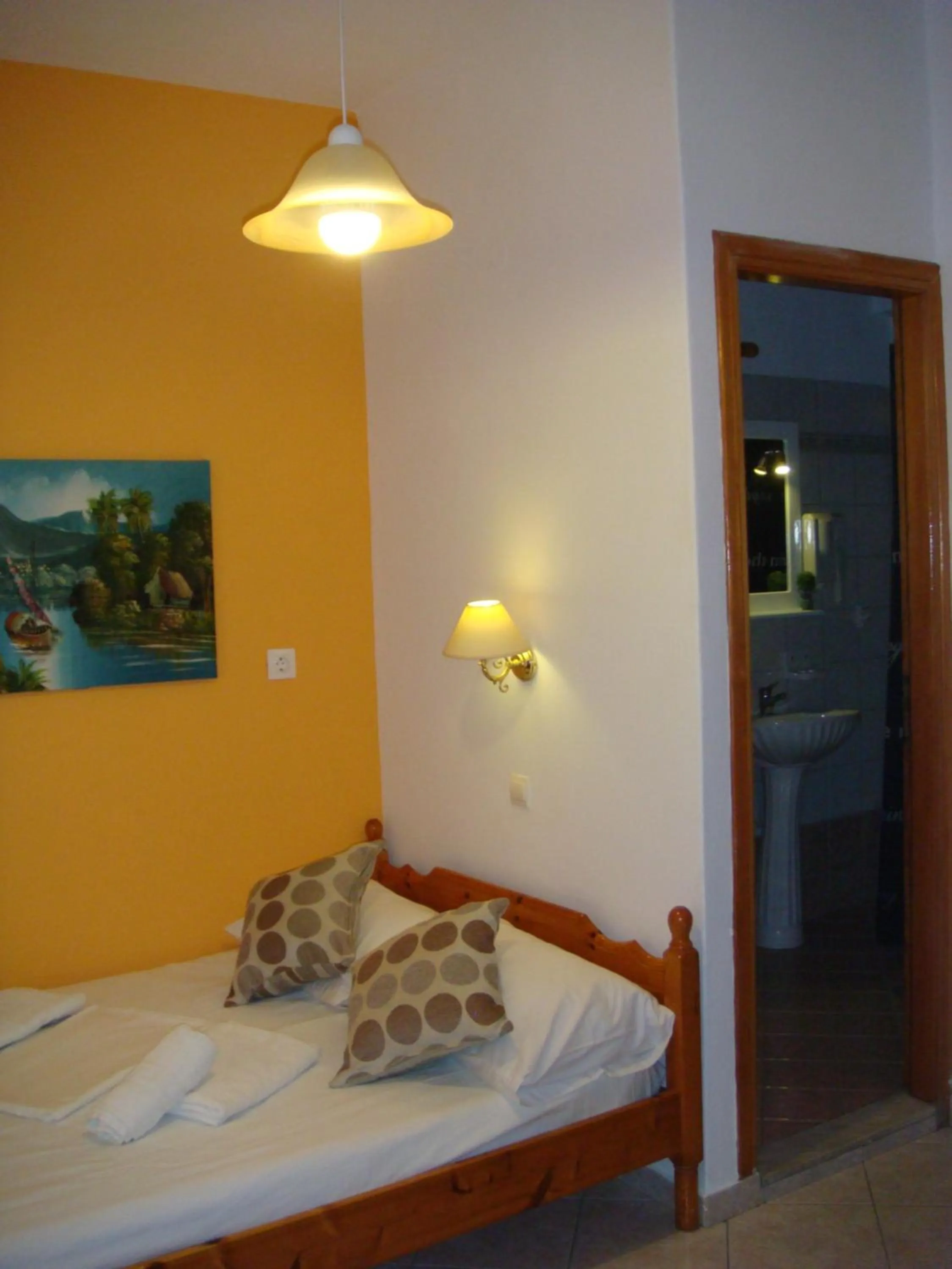 Shower, Bed in Boussetil Rooms CapAnMat