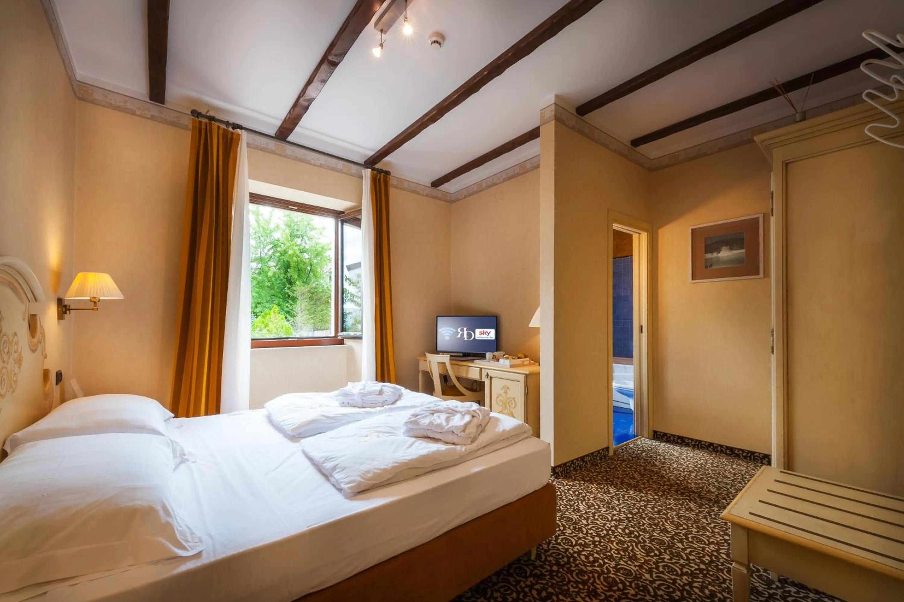 Bed in Relais Ducale Spa & Pool