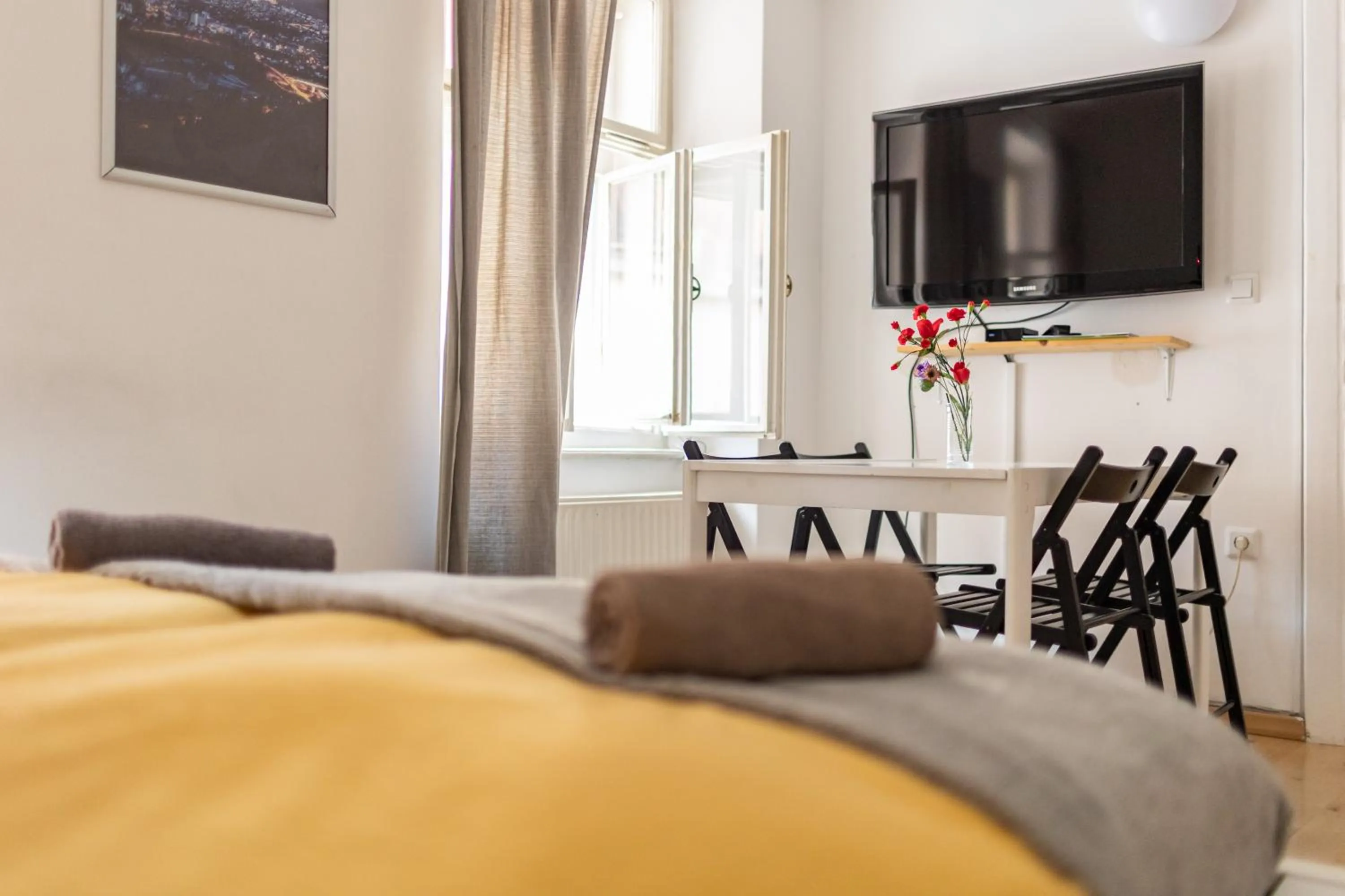 Bed in Cukrarna Guest Accommodation